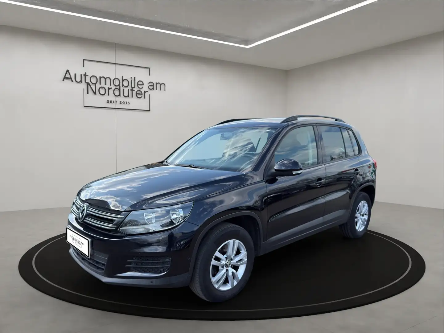 Volkswagen Tiguan 2.0 TSI 4Motion-2Hand-Scheckheft-AHK-Navi-PDC Schwarz - 1