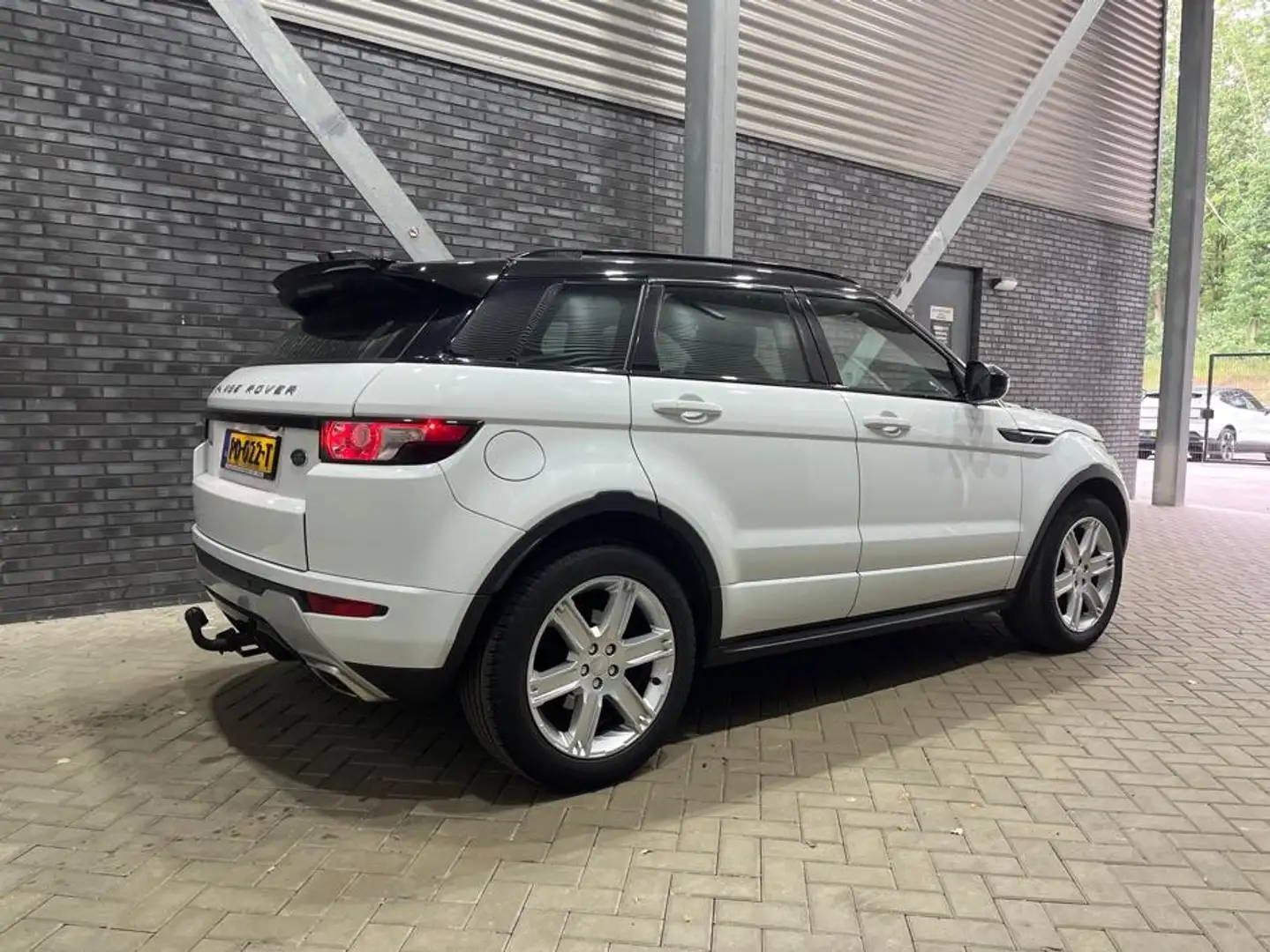 Land Rover Range Rover Evoque 2.0 Si 4WD Sicilian Yellow | Panoramadak | Leder | Wit - 2