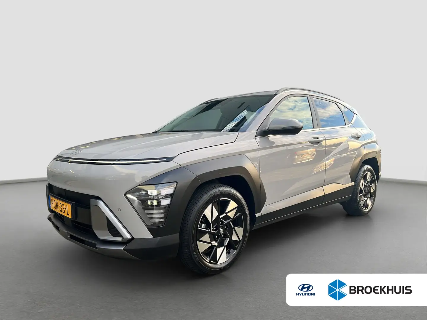 Hyundai KONA 1.6 GDI 141pk HEV Comfort Smart | Camera | Draadlo Grijs - 1