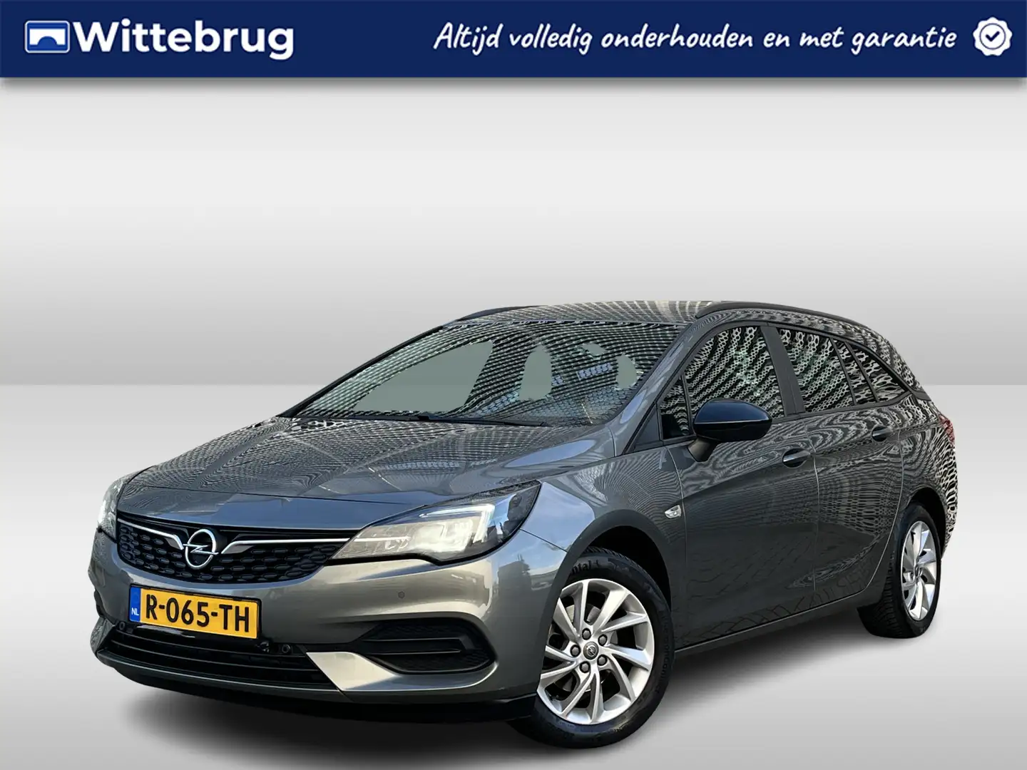 Opel Astra Sports Tourer 1.2 Business Edition / Navigatie / A Grijs - 1