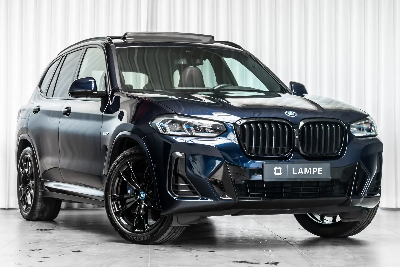 BMW X3 xDrive30e M Sport Pano Trekhaak HiFi Keyless HUD Синій - 1
