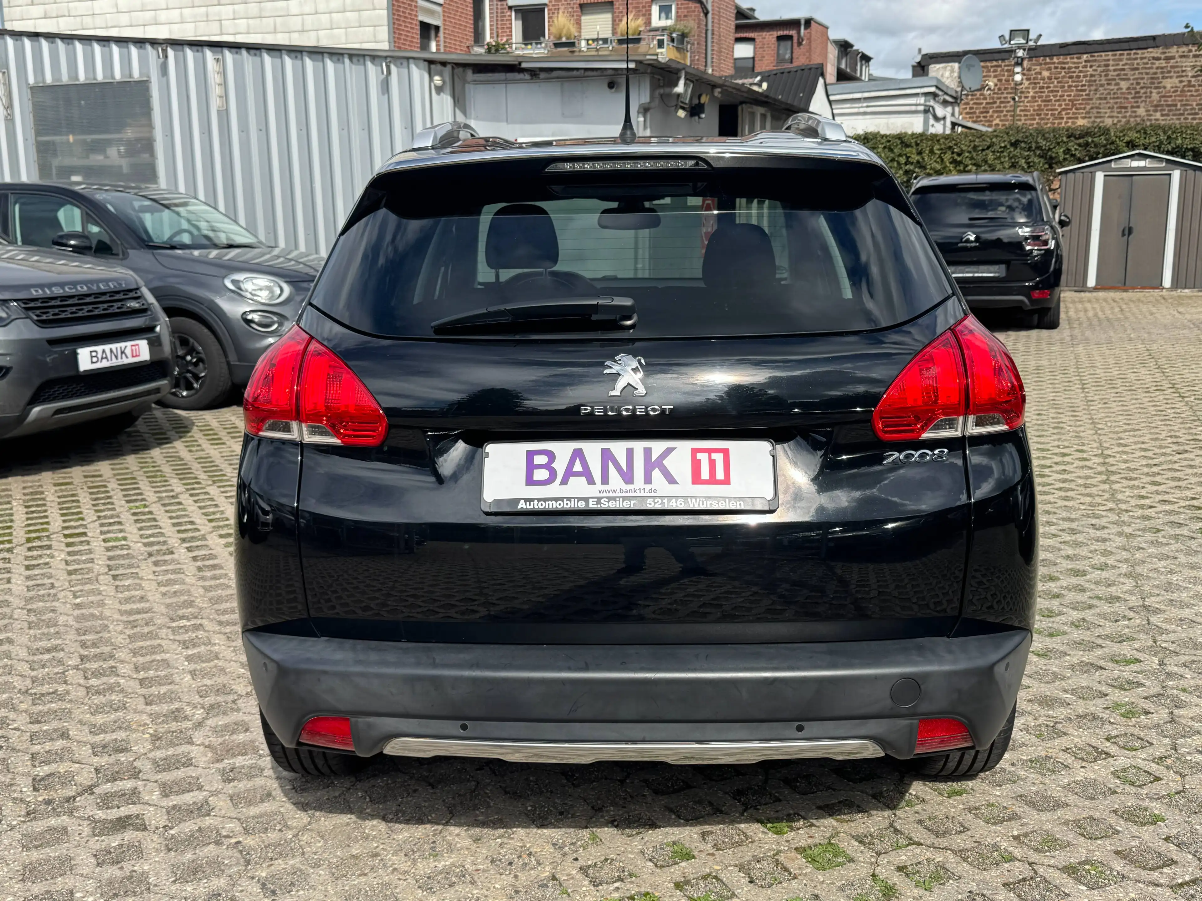 Peugeot 2008 1,2i*Teilleder*Panorama*Scheckheft* — photo 5