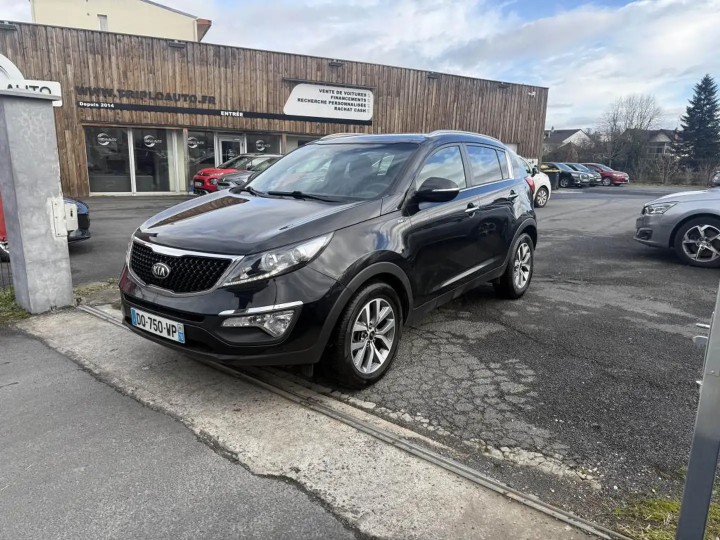 Kia Sportage 2.0 CRDI - 136 4x4 GPS + Toit ouvrant + Caméra de recul + Radars AR Grau - 1