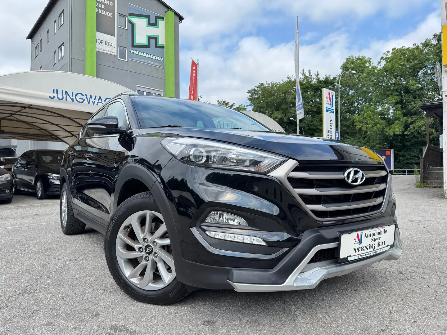 Hyundai TUCSON 1,7 CRDI Start-Stopp Go DCT Aut.+Navi+R-Kamera Schwarz - 1