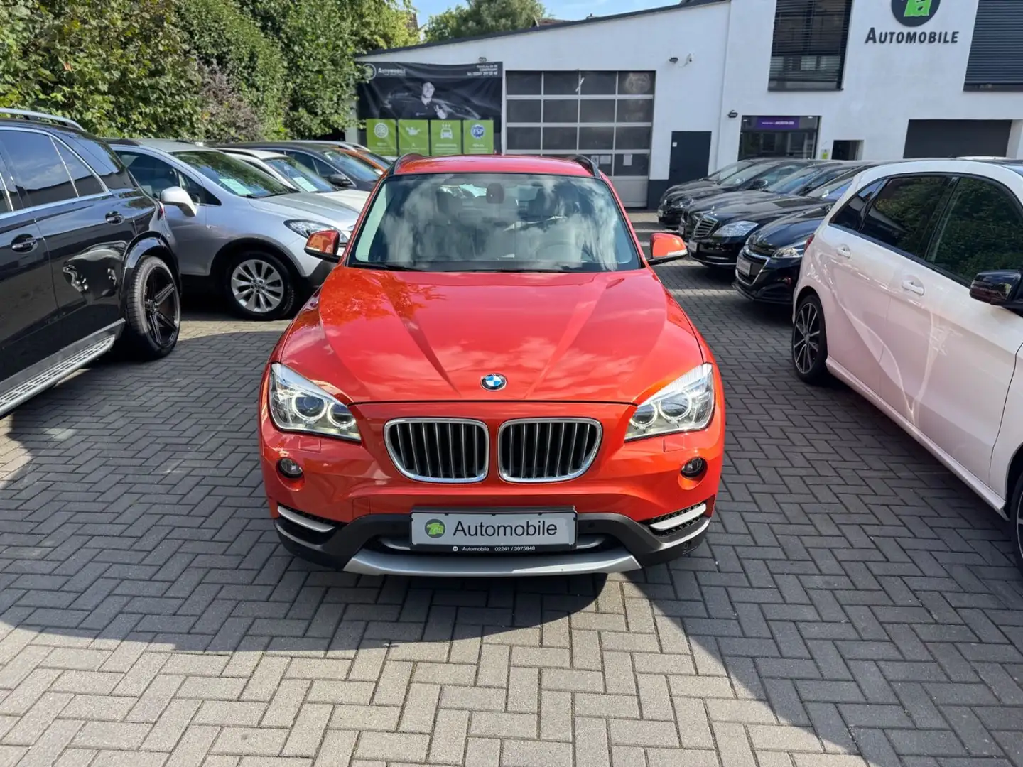 BMW X1 18 d xDrive*NAVI*PDC*SHZ*LEDER*AHK*Bi-XENON Orange - 2