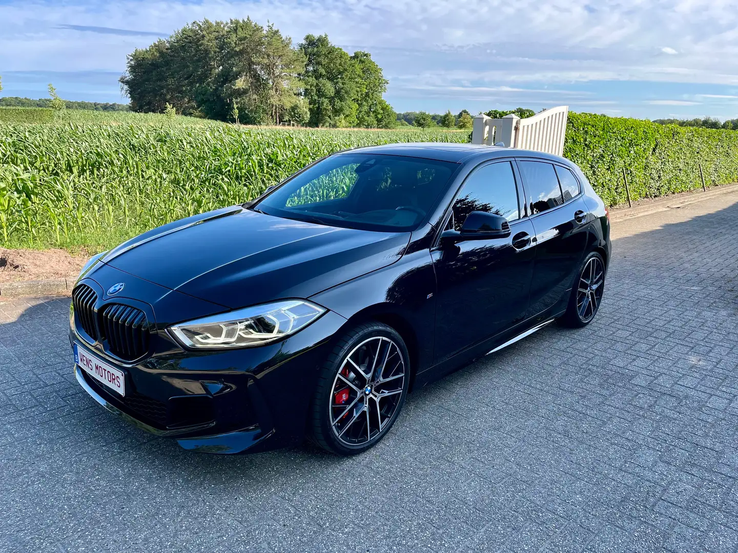 BMW 128 ti 265 Pk 2023 M-Sport/Pano/Led/Carplay/Cruise Zwart - 1
