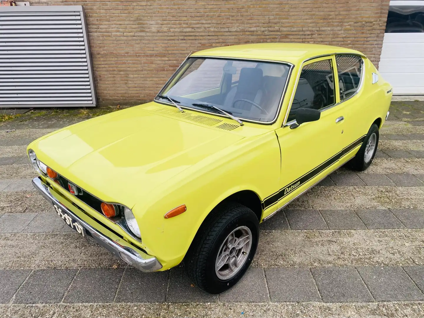 Nissan Cherry Datsun 100a 1.0 de Luxe 100 / 120 A Geel - 1