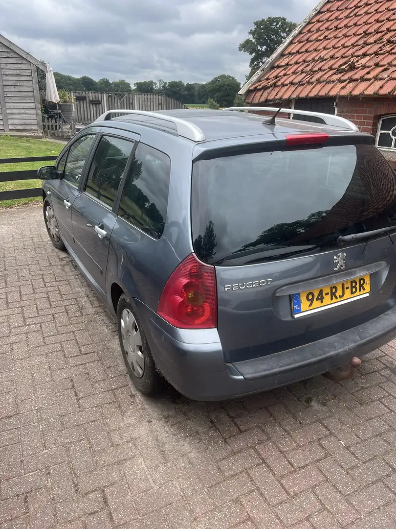 Peugeot 307 1.6 16V Premium lekke koppakking Grijs - 2