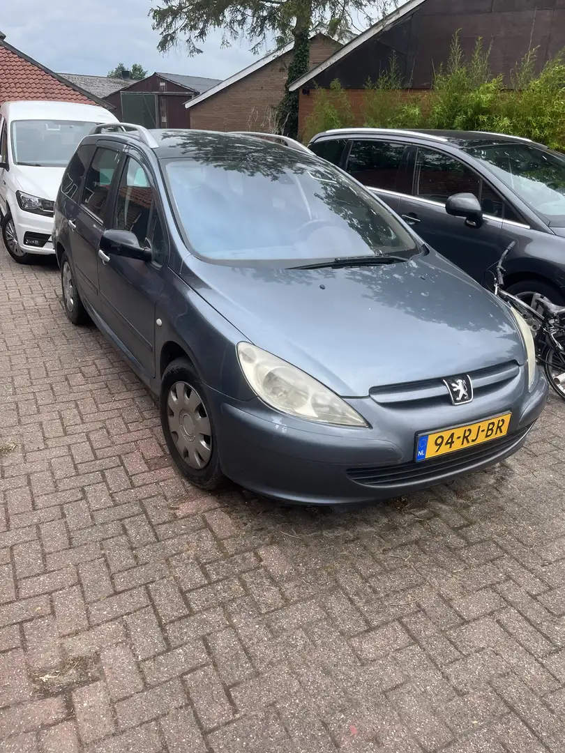 Peugeot 307 1.6 16V Premium lekke koppakking Grijs - 1