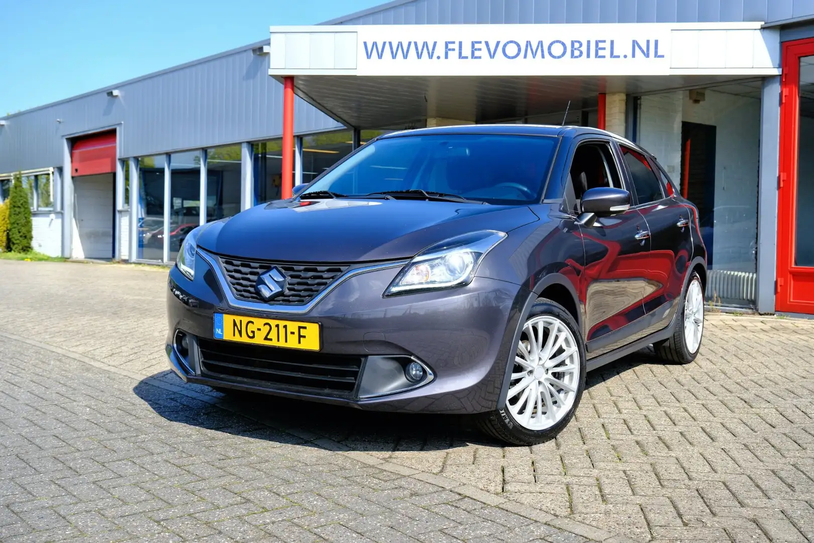 Suzuki Baleno 1.0 Boosterjet High Executive 5-drs Navi|1e Eig!|C Grau - 1
