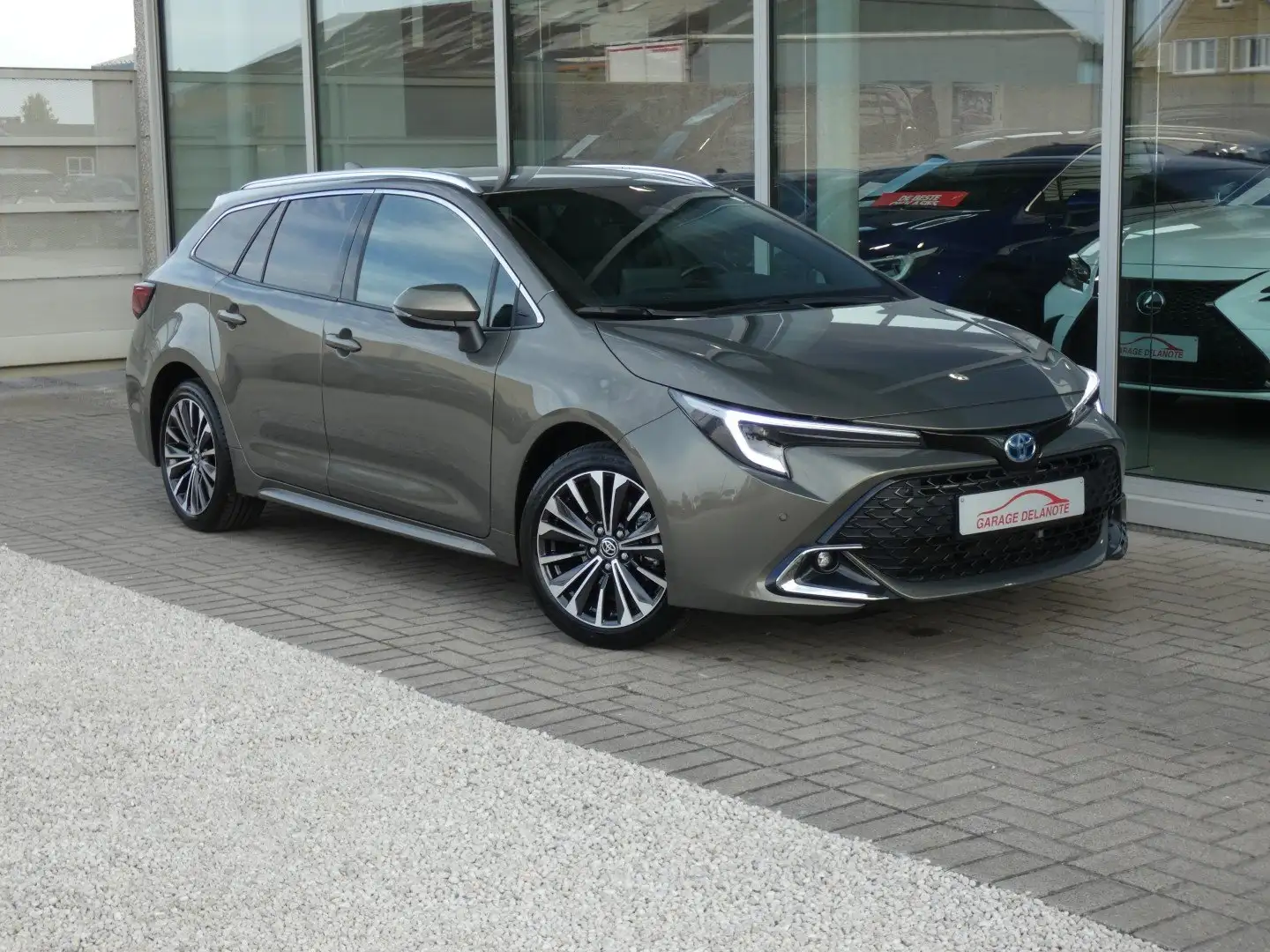 Toyota Corolla TS 1.8 Hybrid STYLE 140pk FACELIFT+Zetelverwarming Brons - 1