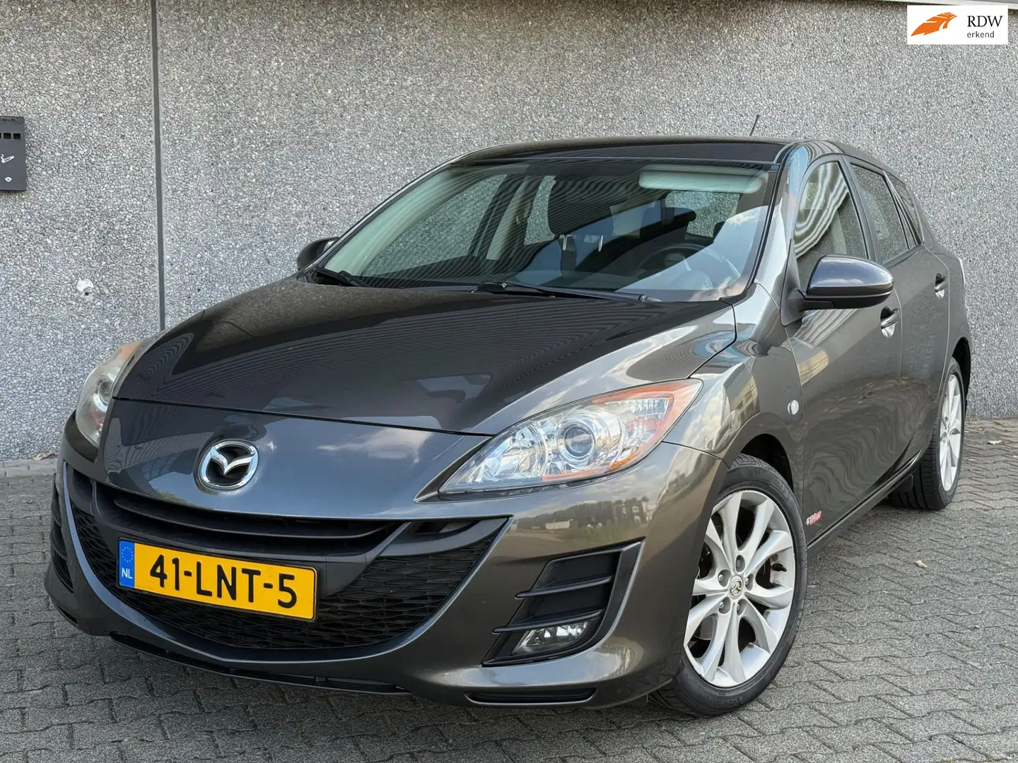 Mazda 3 1.6 GT-M Line Clima org-NL Grijs - 1