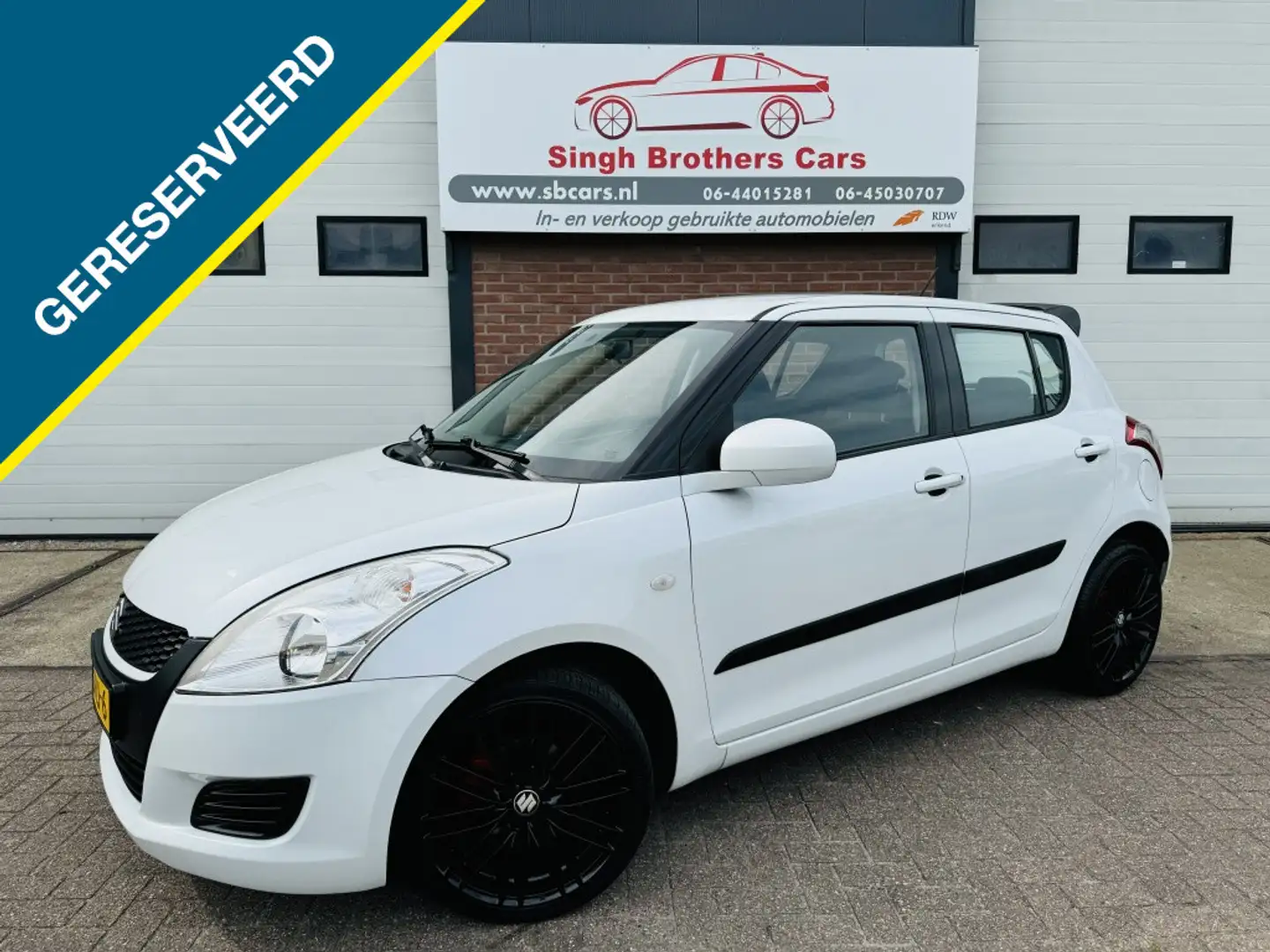 Suzuki Swift 1.2 COMFORT FACELIFT AIRCO NAVI 17"VLG NAP INRUIL Wit - 2