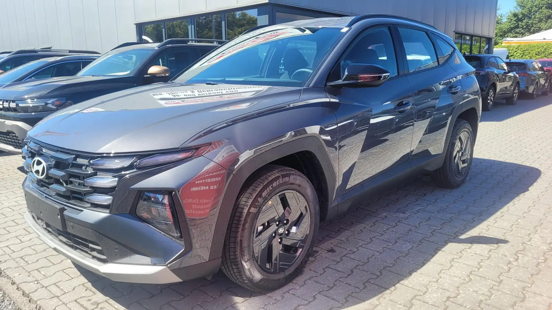 Hyundai TUCSON Black Line Hybrid  Hybrid*LED*Nav*Shzg*PDC*Cam*... Grau - 1