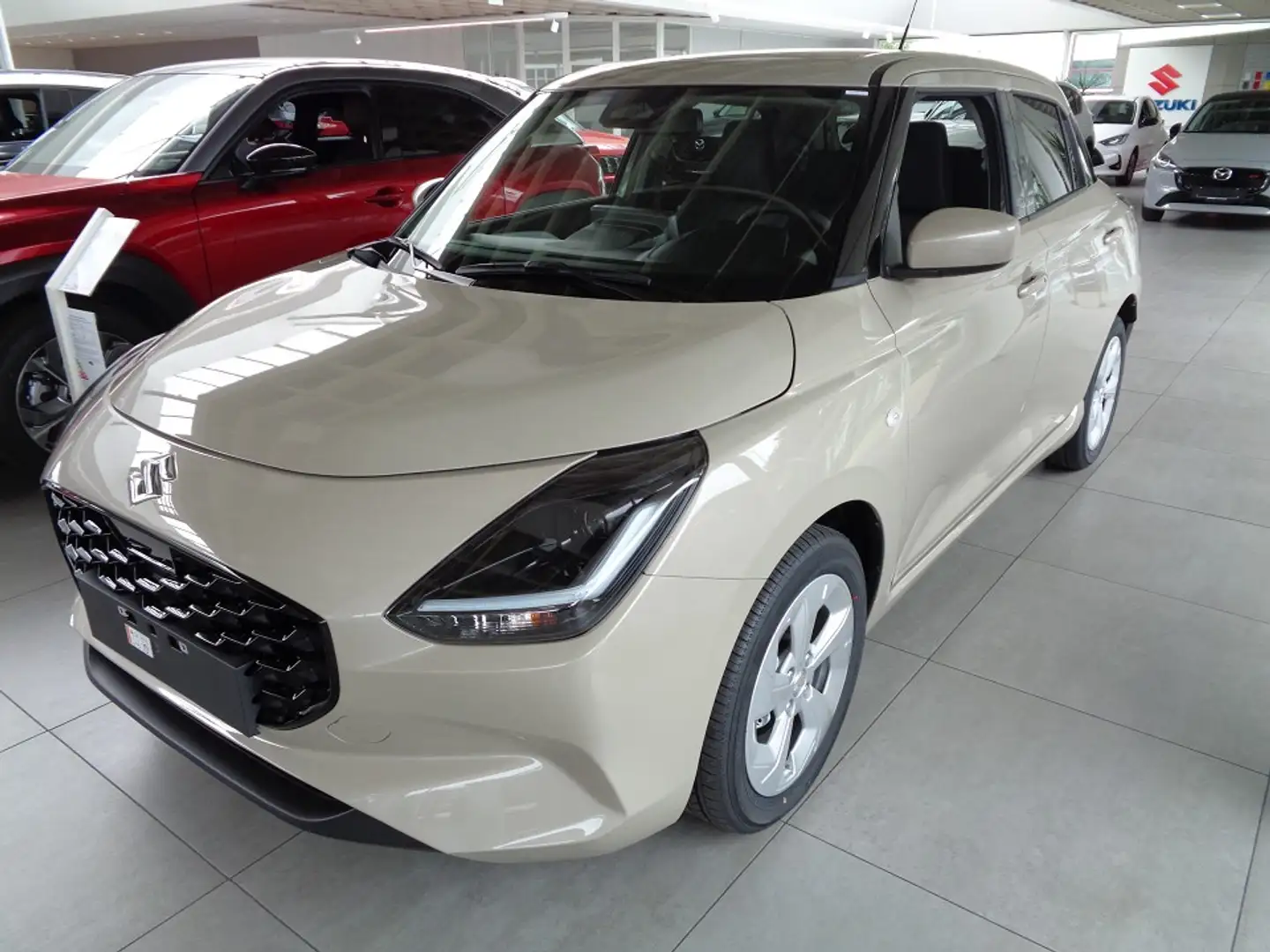 Suzuki Swift Comfort 1.2 Dualjet Beige - 1