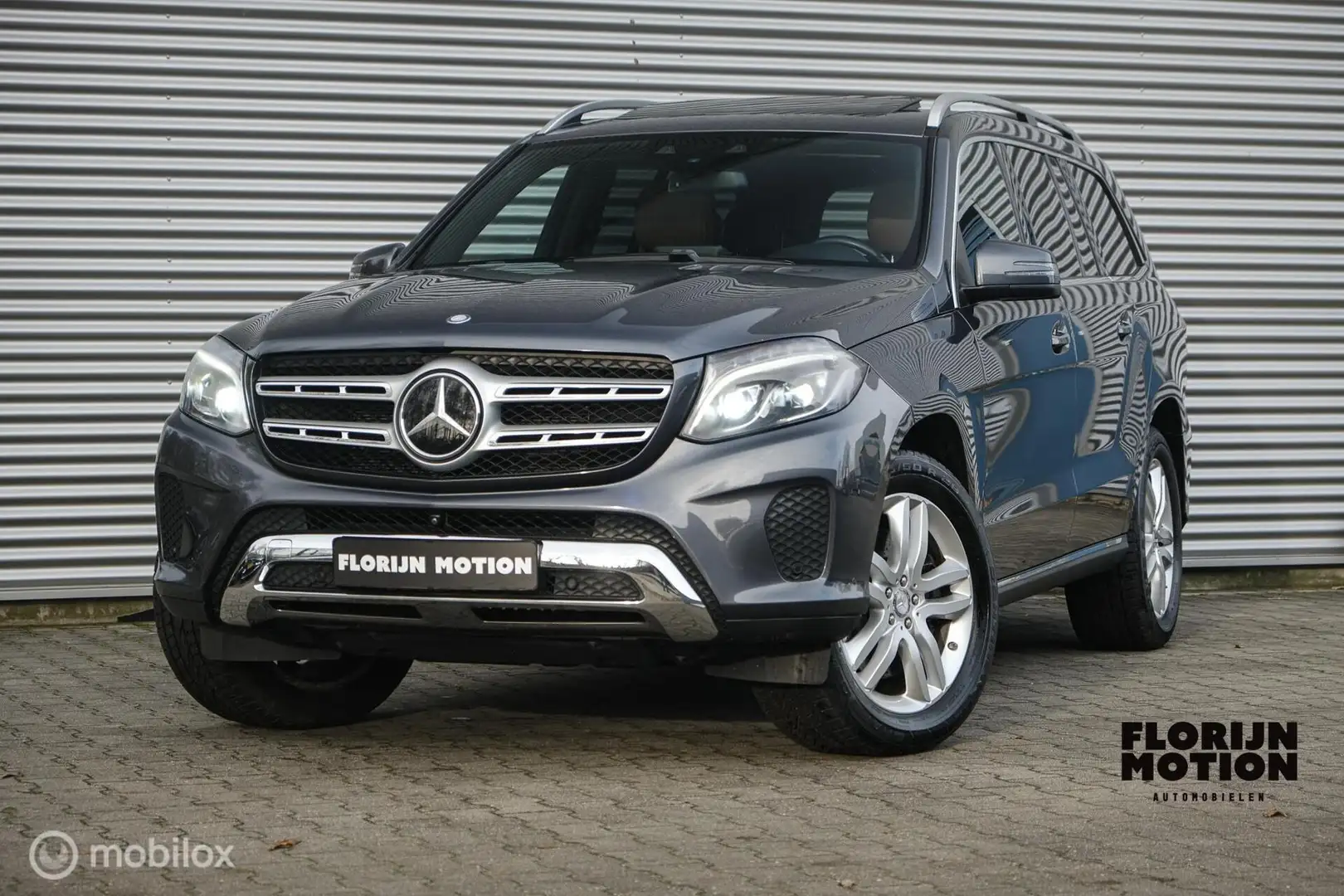 Mercedes-Benz GLS 500 4MATIC | 7 persoons | schuif-kanteldak | Led | Cru Grau - 1