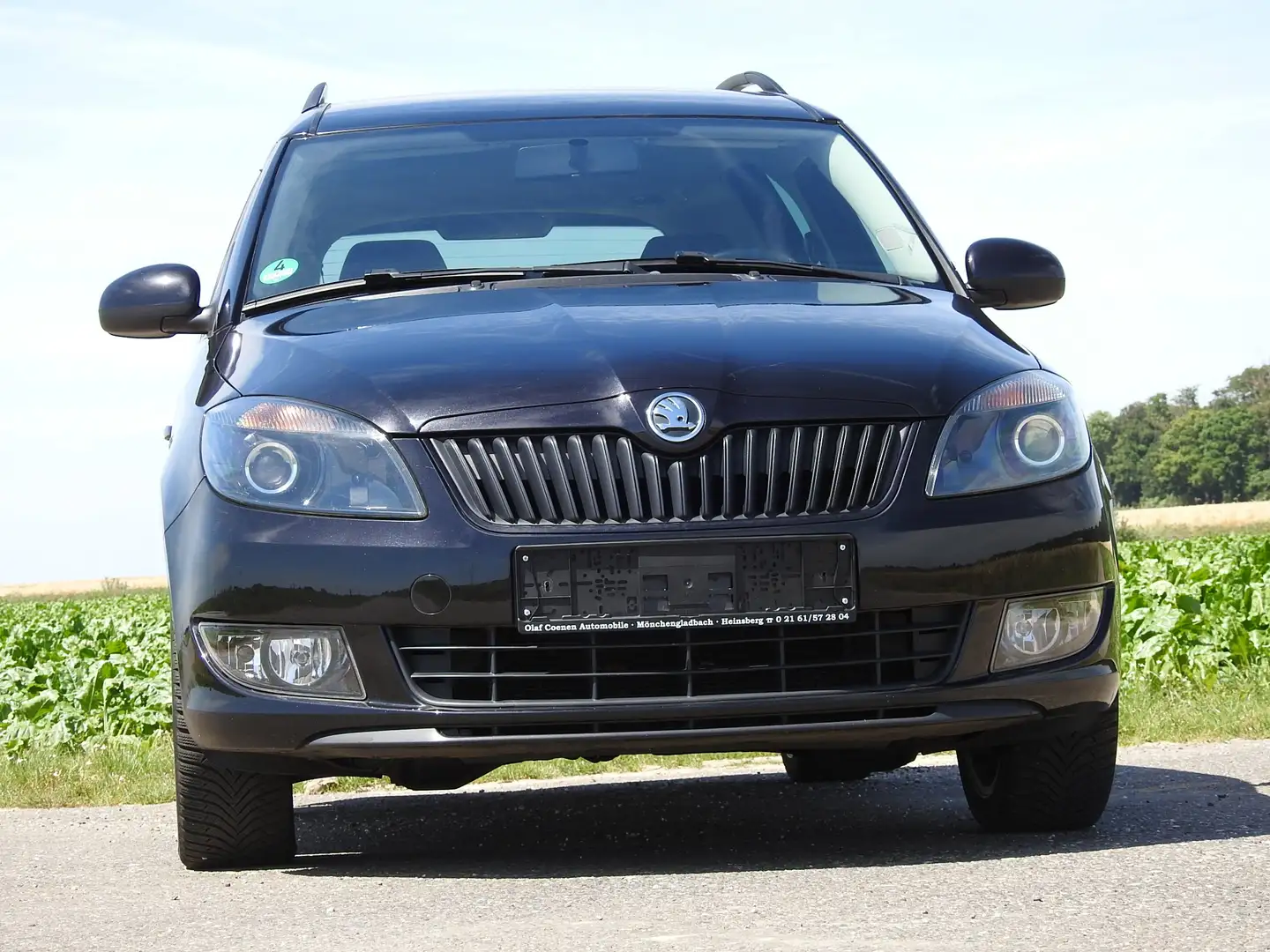 Skoda Roomster 1.2 TSI . Klima. Ganzjahresreifen. Sitzheizung! Schwarz - 2