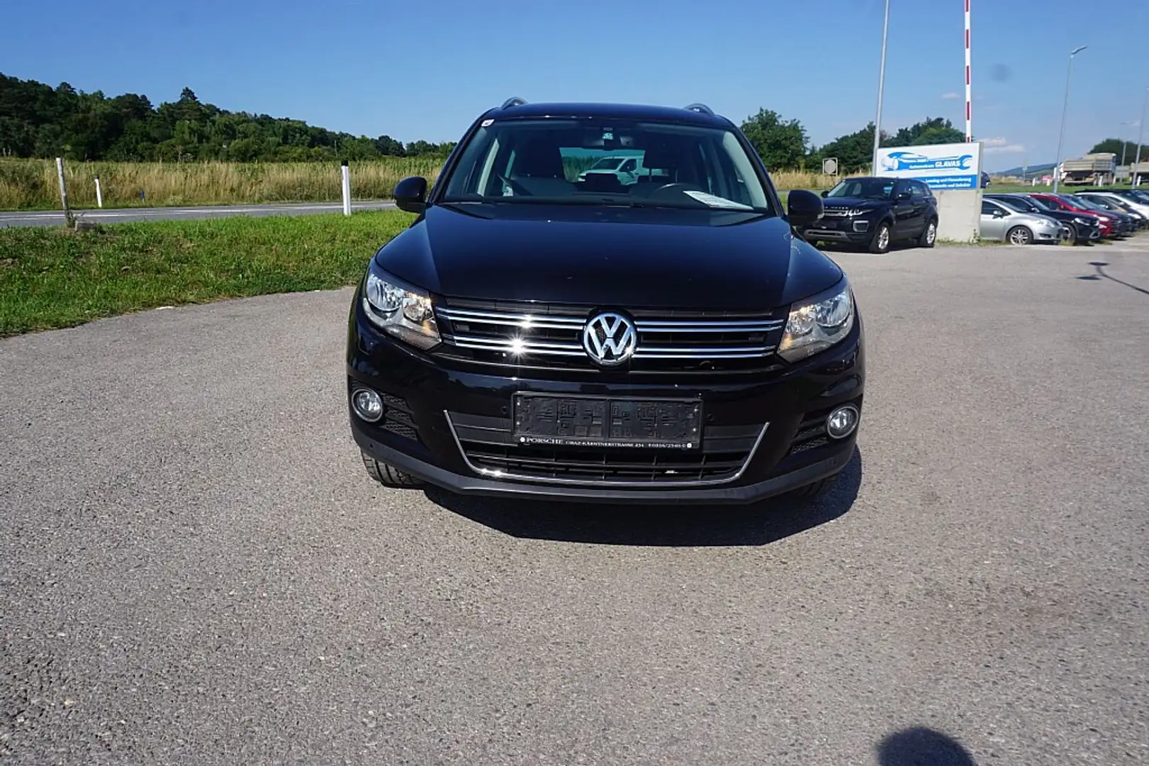 Volkswagen Tiguan 1,4 TSI Sport&Style BMT Schwarz - 1