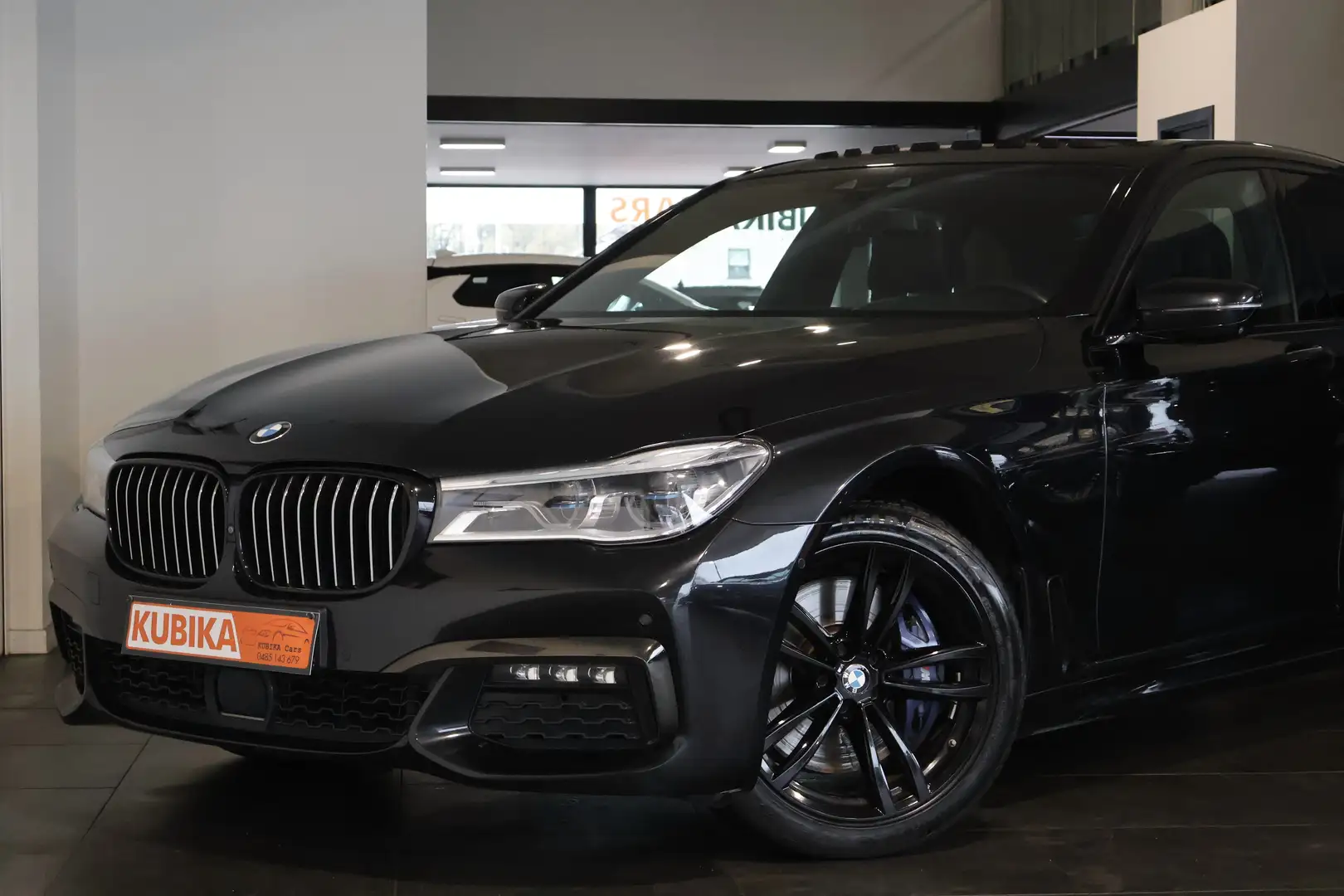 BMW 750 750d xDrive*BTW* M-Pack Full Optie TrekH Pano12M* Zwart - 2