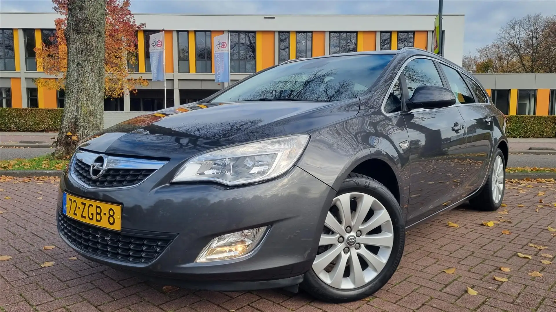 Opel Astra 1.4 Turbo 120pk Cosmo 1e eigenaar/ NL-auto Gris - 1