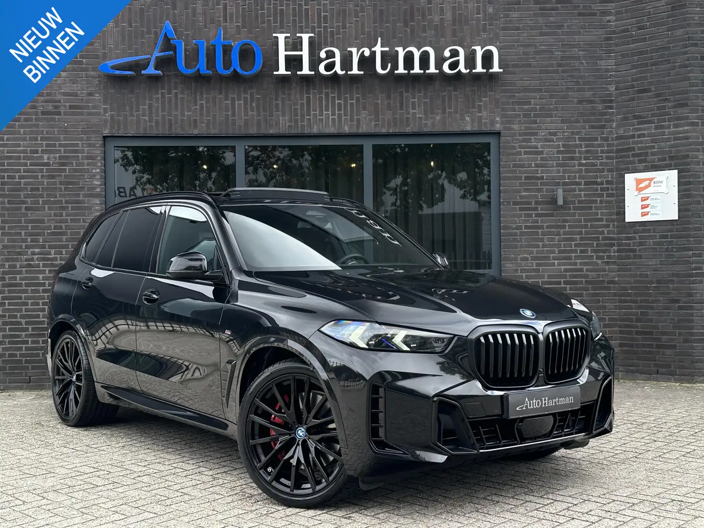 BMW X5 xDrive50e M Sport Pro PANO|H&K|ICONICGLOW|ACHTERAS Negro - 1