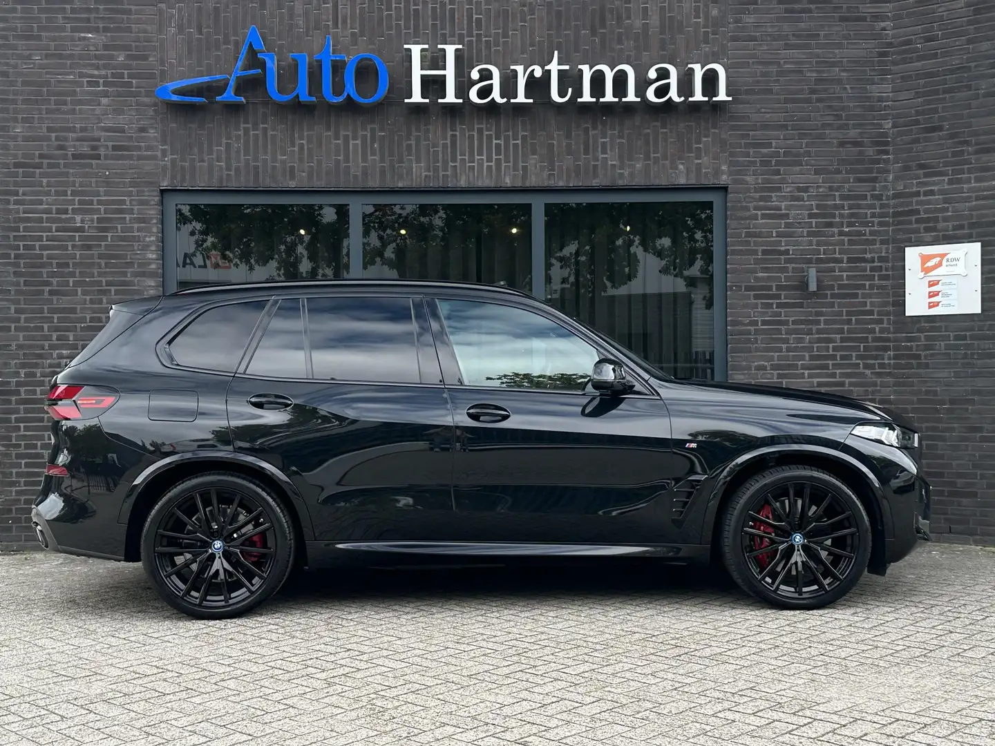 BMW X5 xDrive50e M Sport Pro PANO|H&K|ICONICGLOW|ACHTERAS Negro - 2