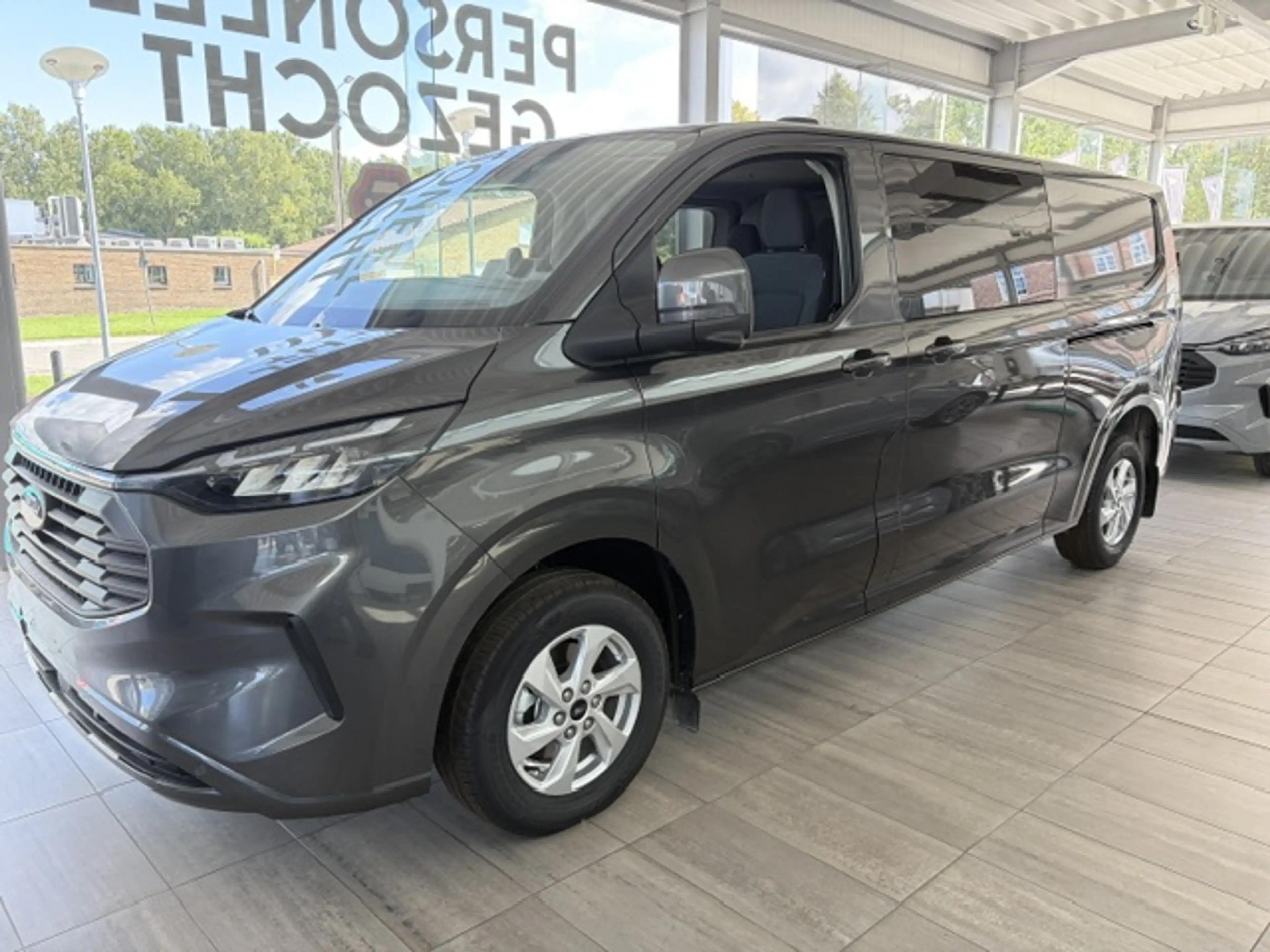 Ford Transit Custom 2.0 TDCi L2H1 Limited 170pk Multi-use 5pl — photo 4