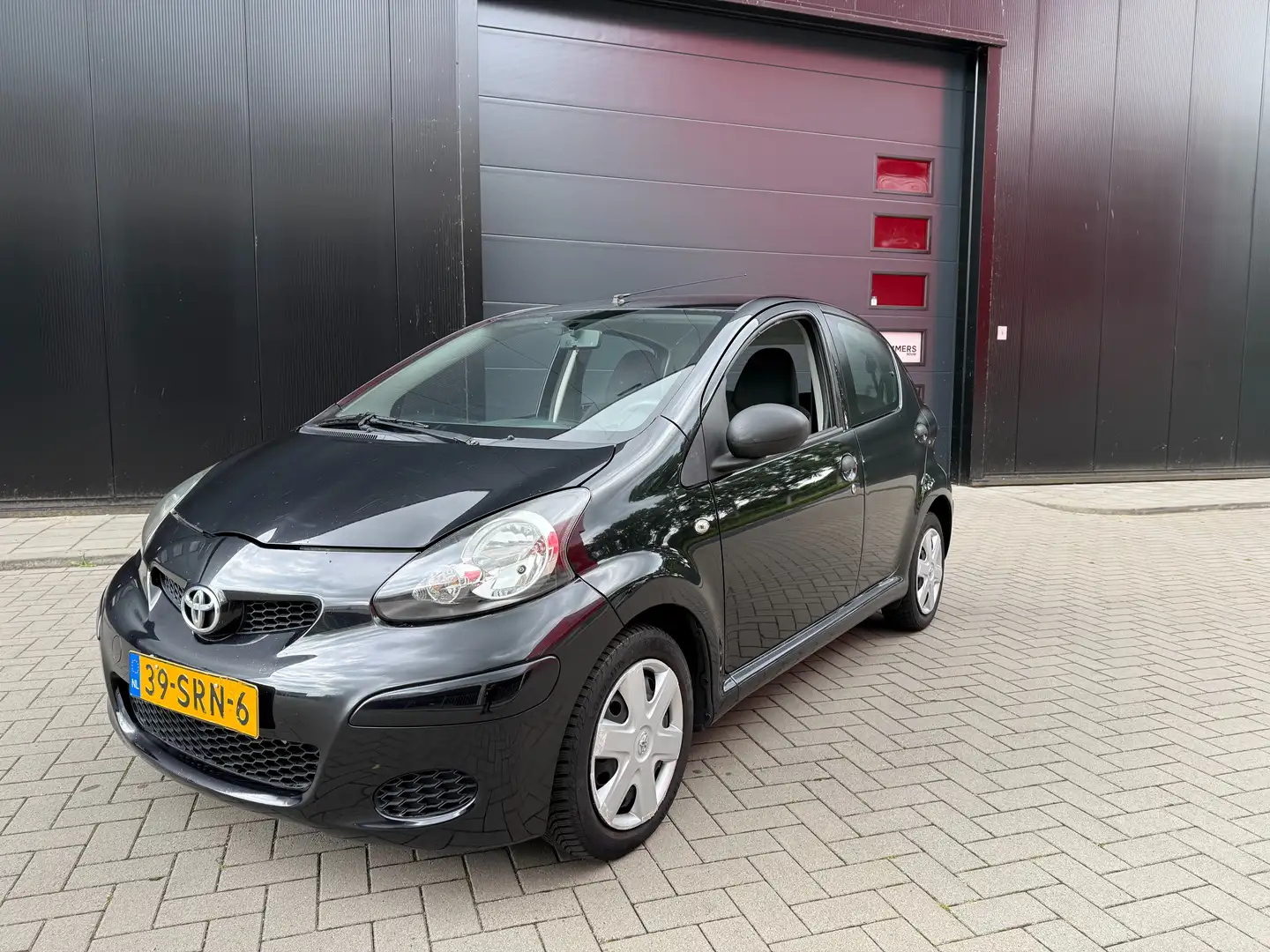 Toyota Aygo Aygo 1.0-12V Now Airco 5-DRS  N.A.P Zwart - 1