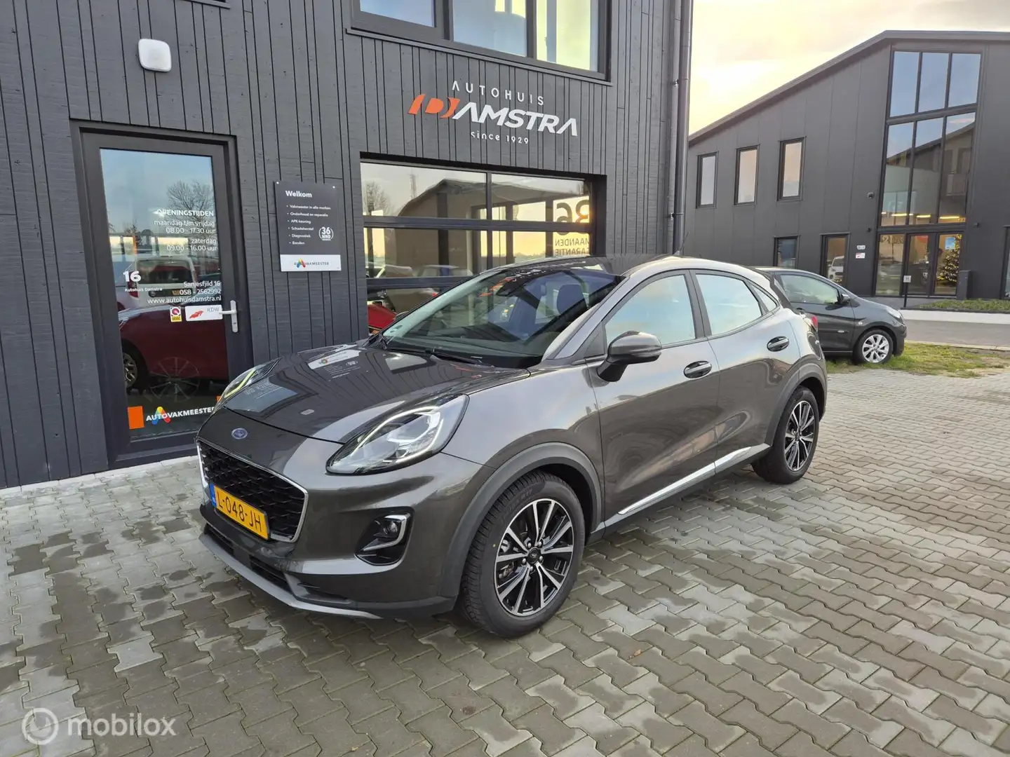 Ford Puma 1.0 EcoBoost Hybrid Titanium|Navi|Trekhaak|Stoelve Grijs - 1