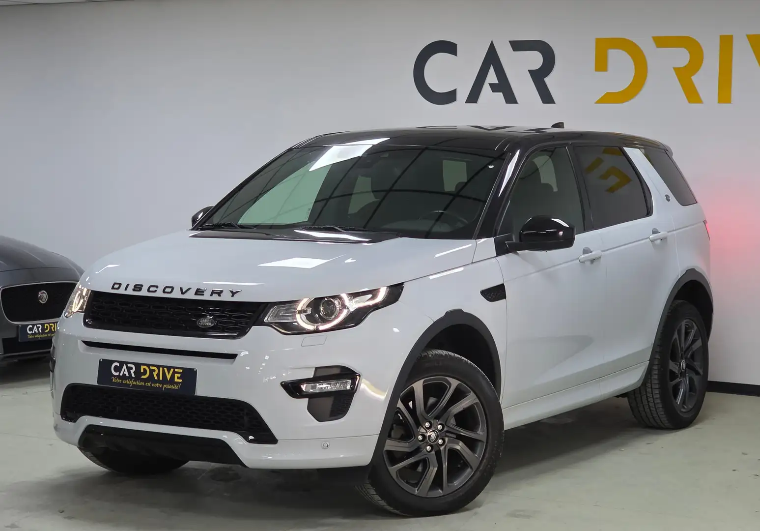 Land Rover Discovery Sport 2.0 D 4WD PANO/CUIR/CAMERA/CAPTEURS/CRUISE/XENON Blanc - 1