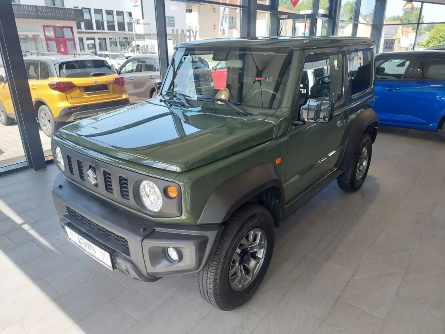 Suzuki Jimny Comfort+ Allgrip 1.5 AHK Xenon NAV 1.Hand Grün - 2