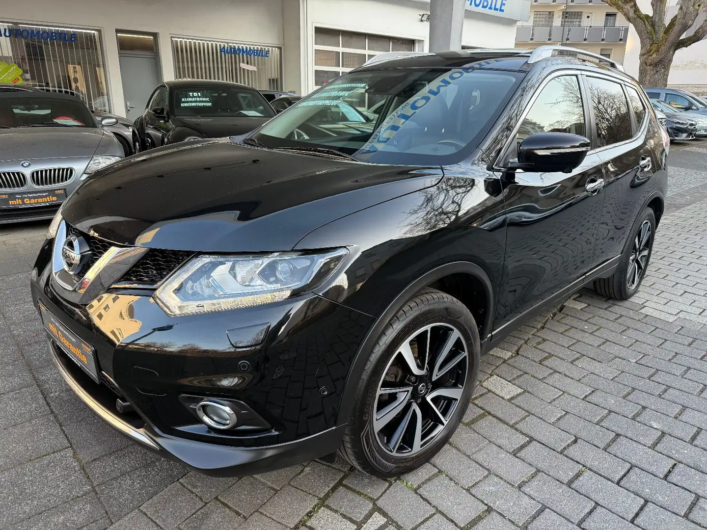 Nissan X-Trail Tekna 1.6 DIG,AHK,Pano.,Leder,360°Kamera Schwarz - 1