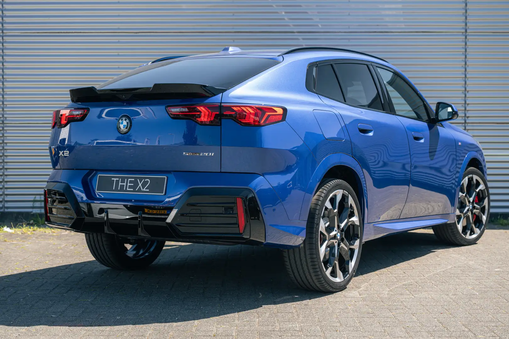 BMW X2 sDrive20i M Sport Automaat / Sportstoelen / Adapti Blauw - 2