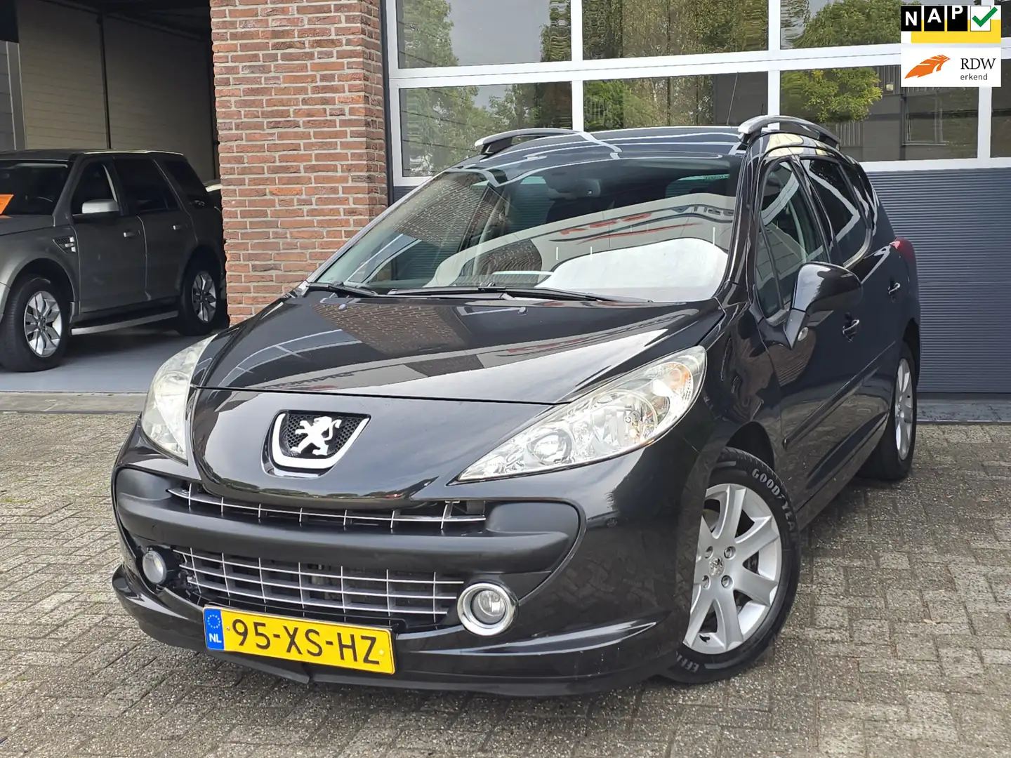 Peugeot 207 SW 1.6 VTi XS Première Pano |Nap |Clima |Apk Zwart - 1