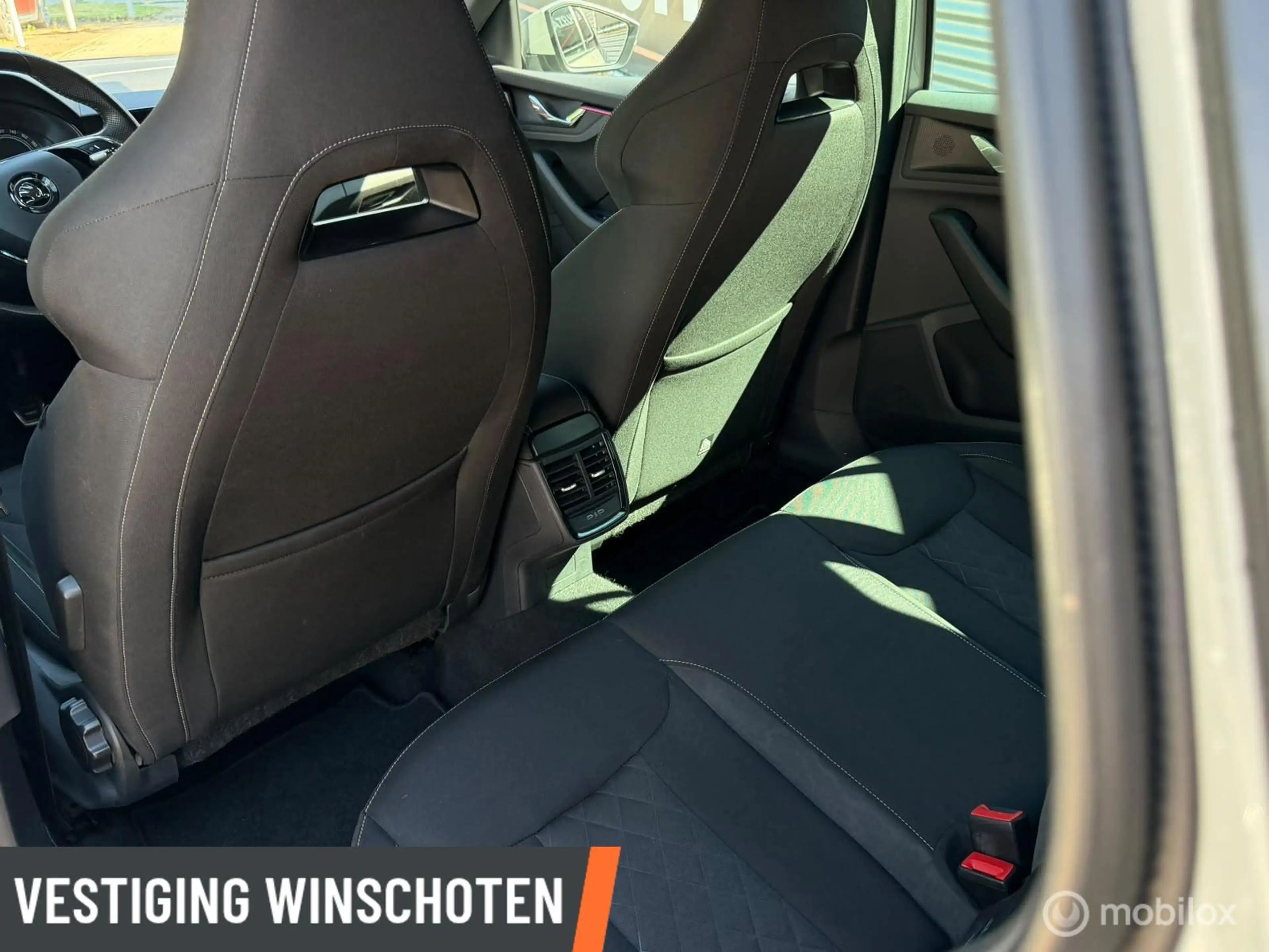 Skoda Kamiq 1.0 TSI Sport Business — photo 10