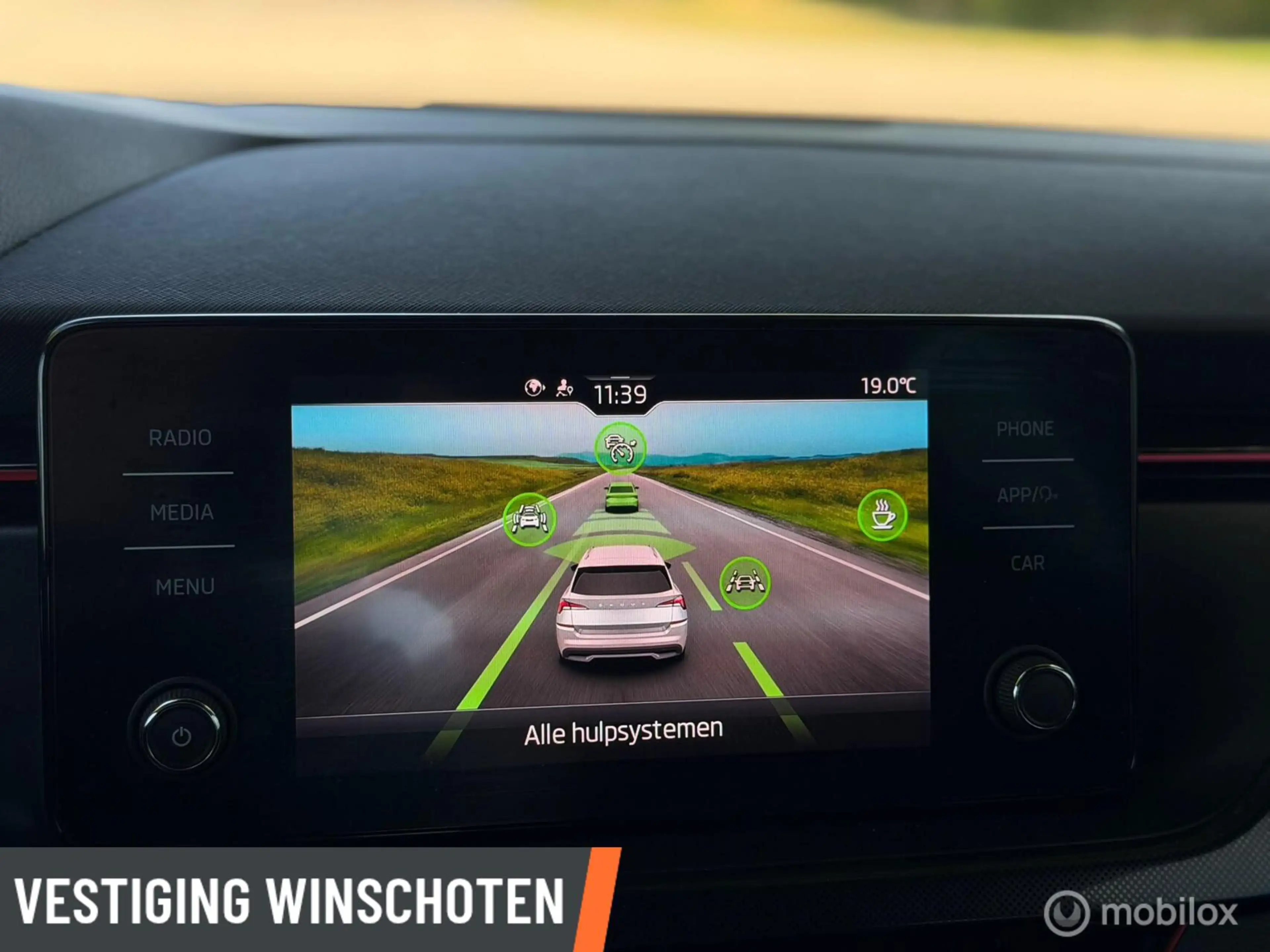 Skoda Kamiq 1.0 TSI Sport Business — photo 9