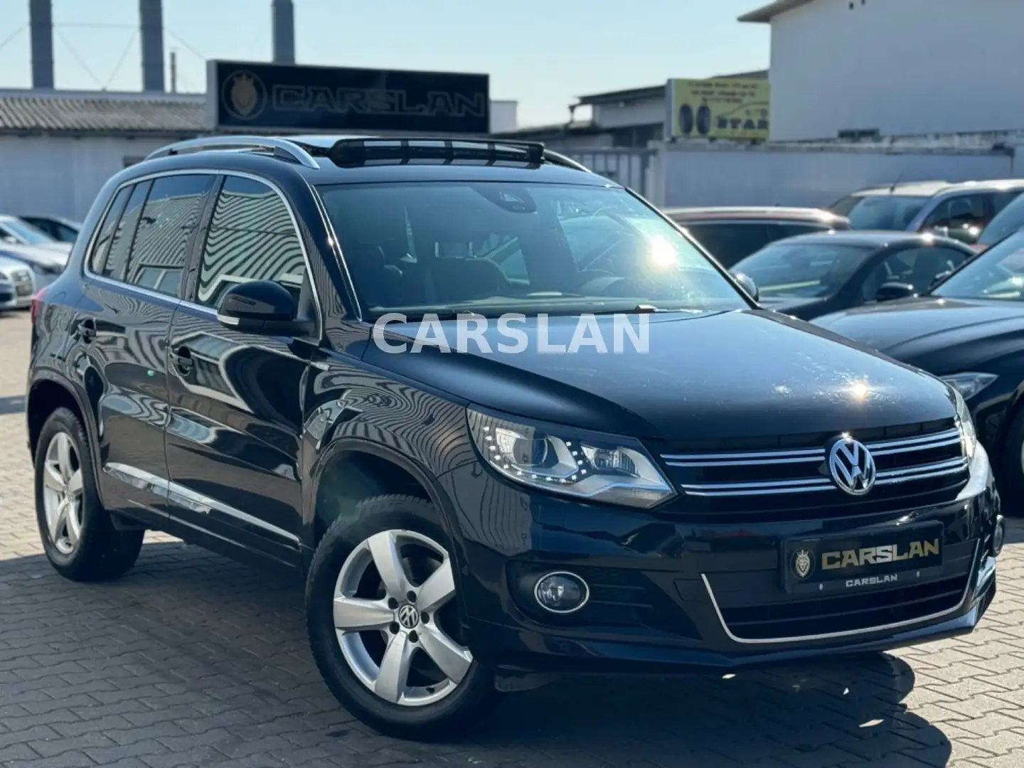 Volkswagen Tiguan 2.0 TDI DSG 4MOTION "2.HAND+LED+AHK+PANO" Schwarz - 1