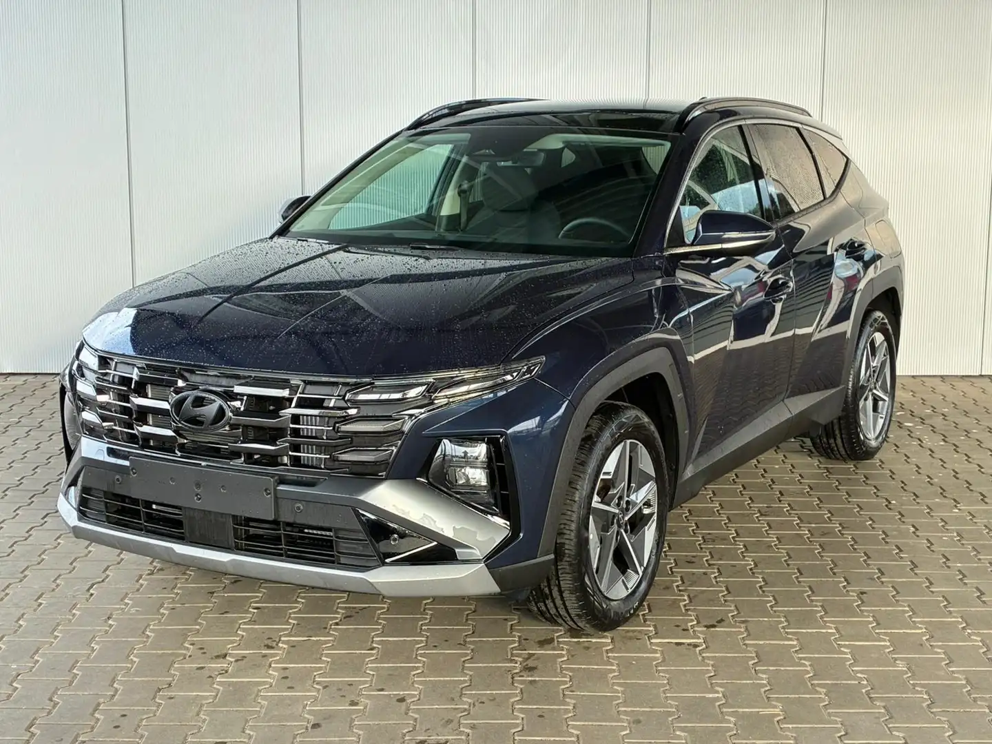 Hyundai TUCSON E-Motion 1.6 T-GDI 2WD 48V DCT / Panoramadach A... Blau - 1