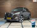 Hyundai TUCSON 1.6 T-GDi Premium 4WD Automaat | Pano | Winterpakk Bruin - thumbnail 1