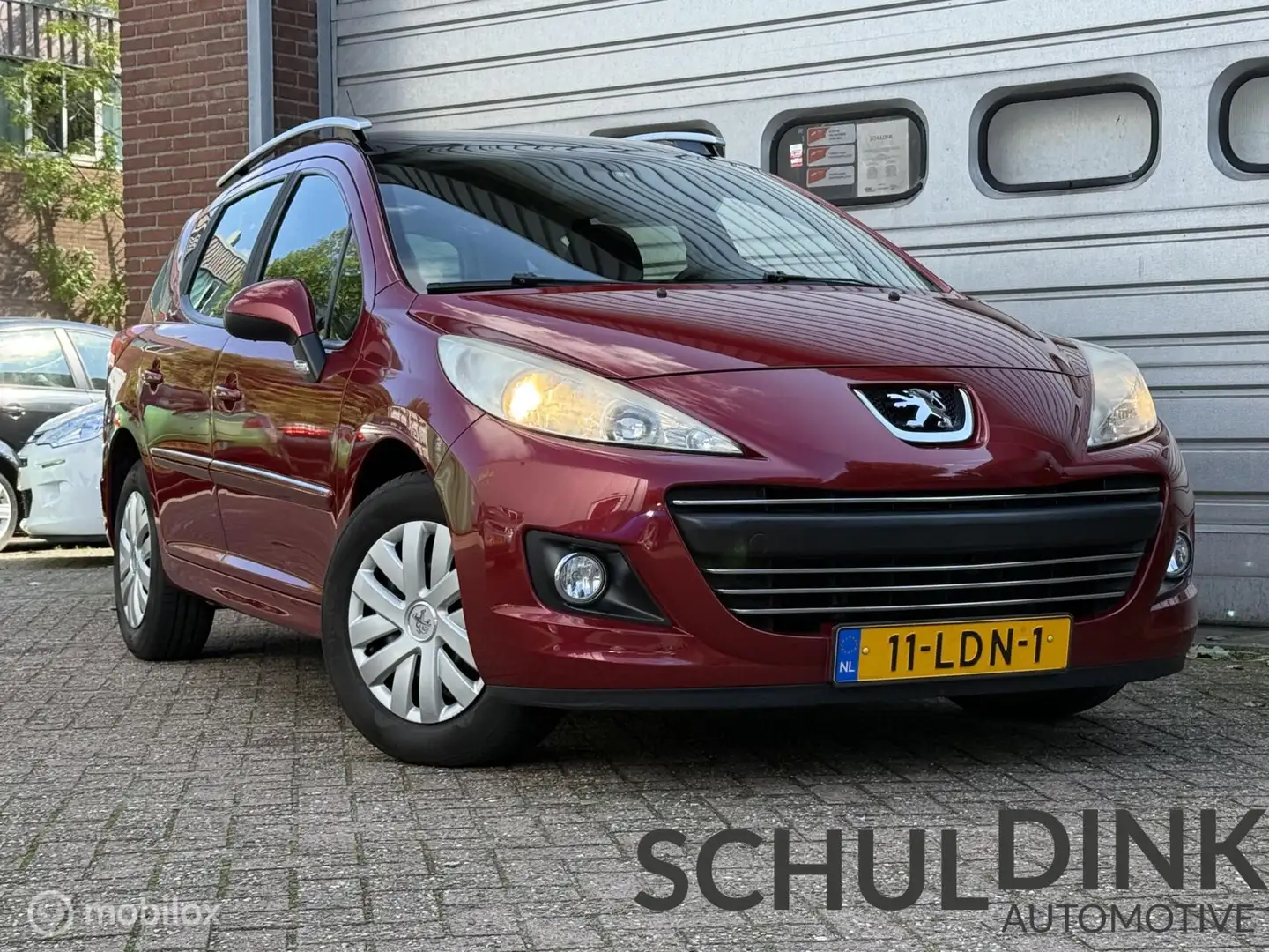 Peugeot 207 SW 1.4 VTi Style AIRCO|CRUISE CONTROLE|CLIMA Rood - 1