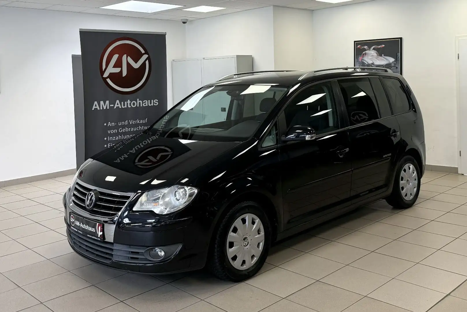Volkswagen Touran United 1,4 DSG *7Sitzer*StdHzg*PDC*Klima Noir - 1