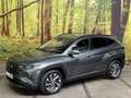 Hyundai TUCSON 1.6 T-GDI MHEV Comfort Automaat Leder Stoelverwarm Gris - thumbnail 1