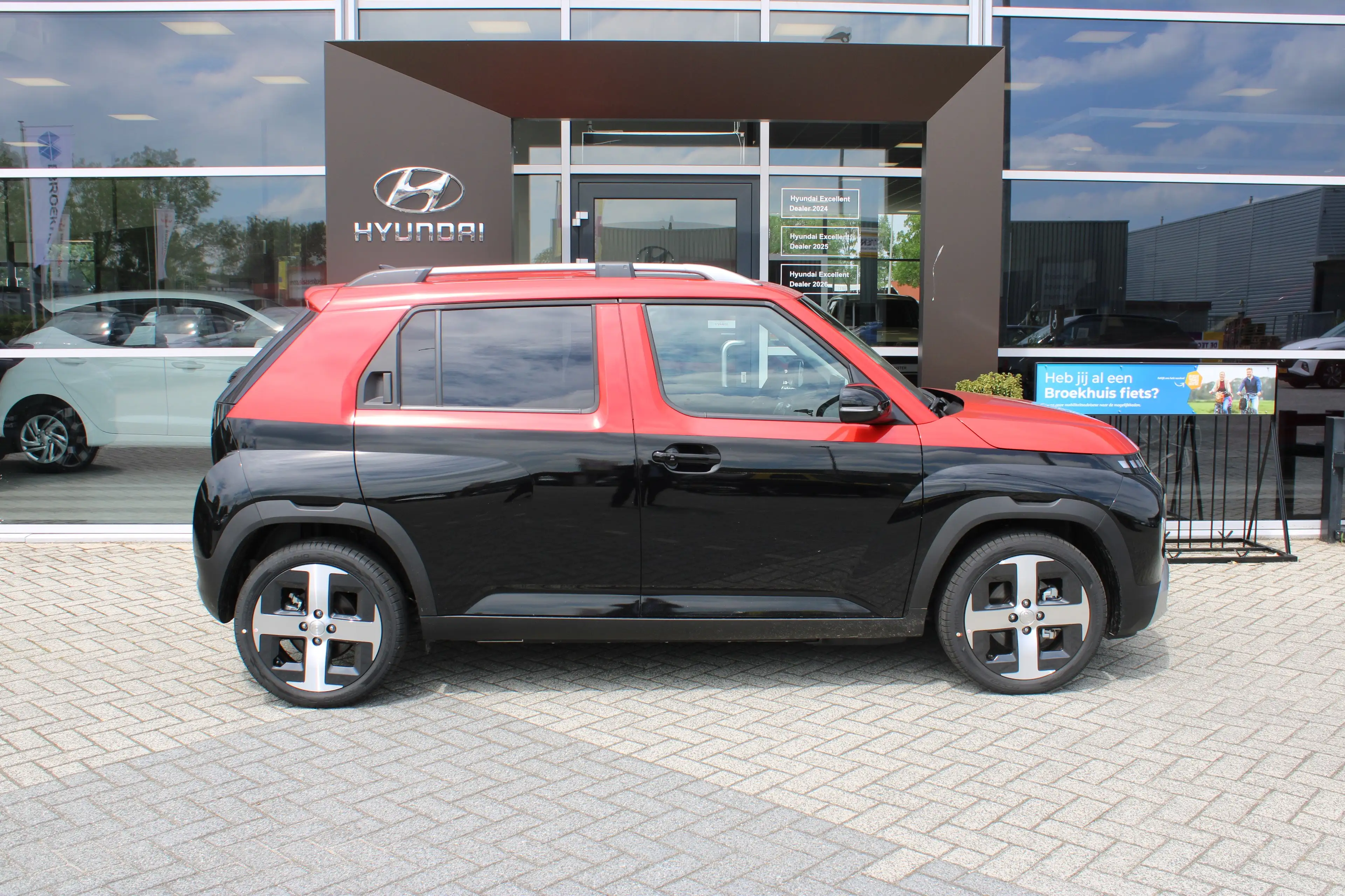 Hyundai Inster Evolve Sky 49 kWh | Tweekleurig| Glazen dak | Stoe — photo 5
