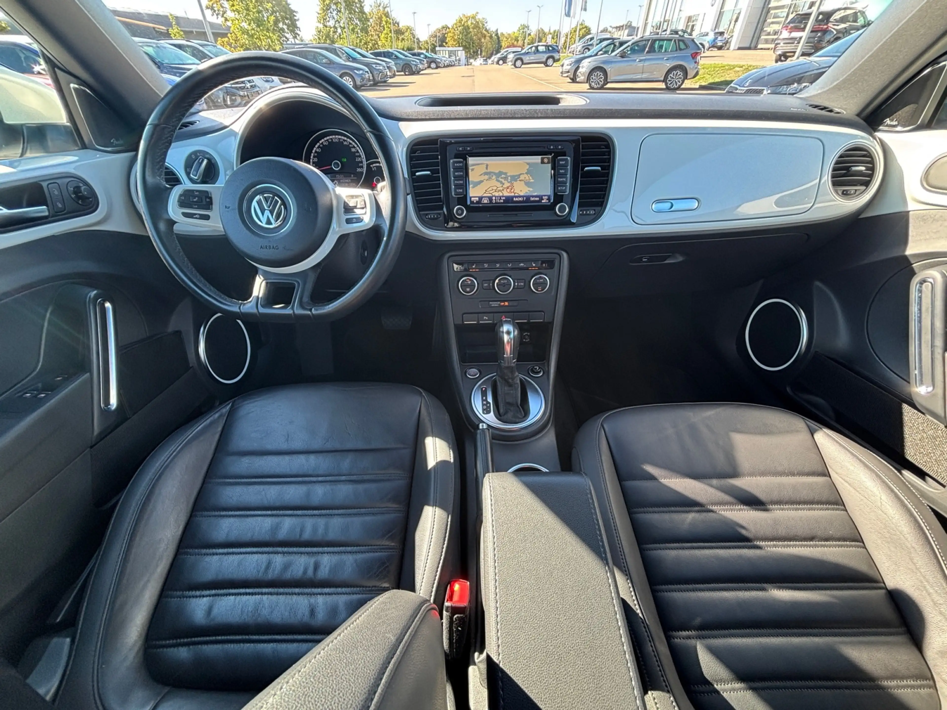 Volkswagen Beetle Cabriolet 1.2 TSI DSG Design Navi Xenon SHZ PDC G — photo 10