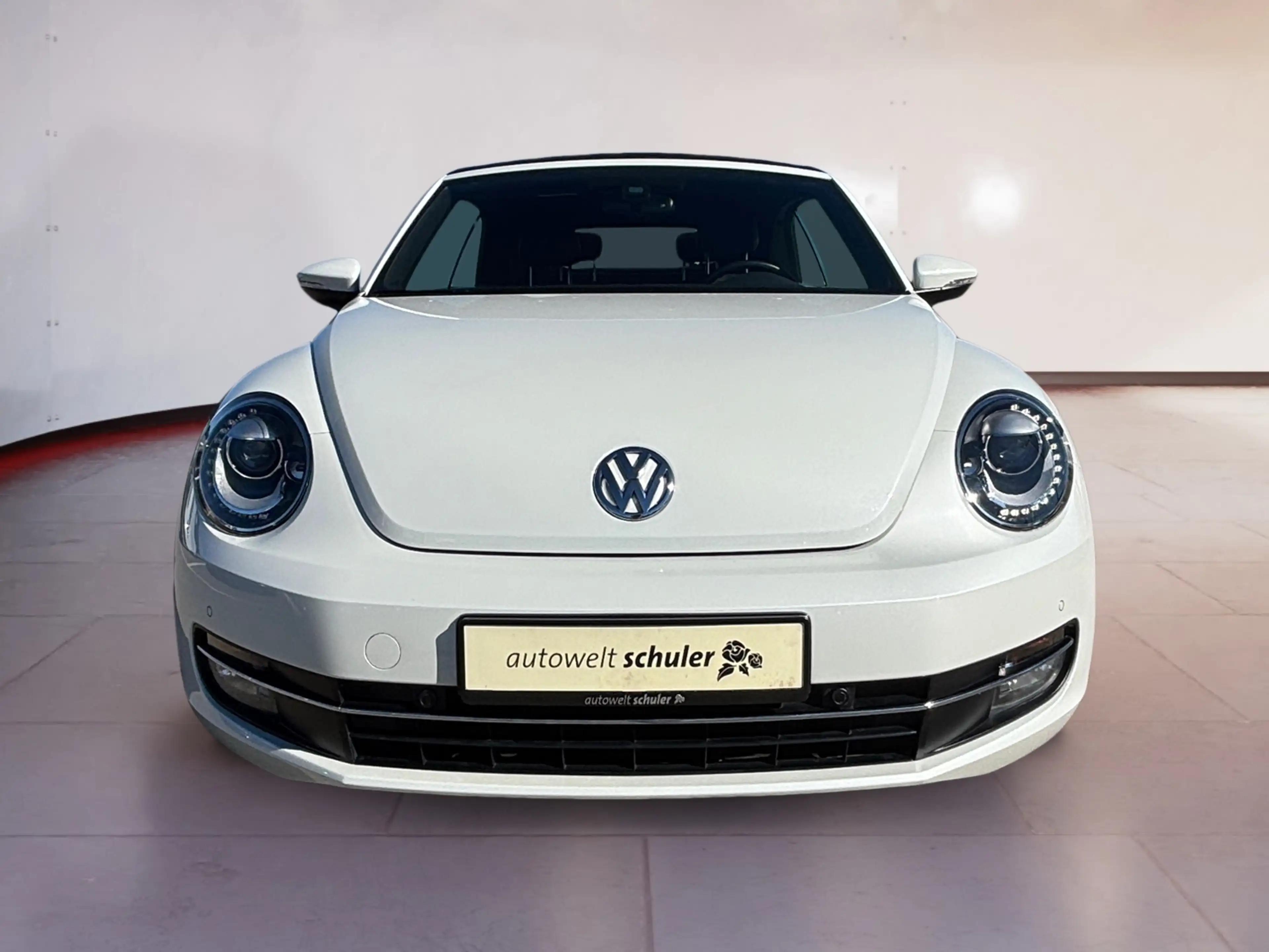 Volkswagen Beetle Cabriolet 1.2 TSI DSG Design Navi Xenon SHZ PDC G — photo 6