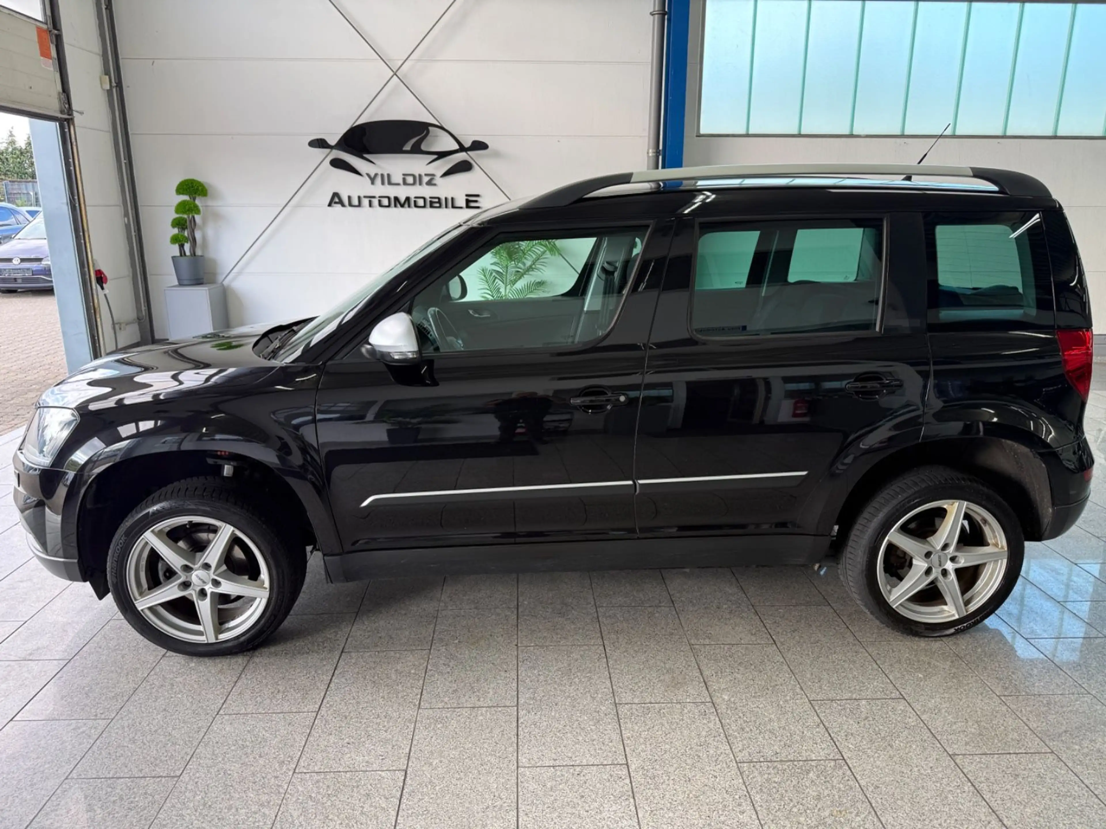 Skoda Yeti 1.4 TSI*AUTOM*ADEVNT*BI-XN*CAM*TEMP*AHK*PDC — photo 10