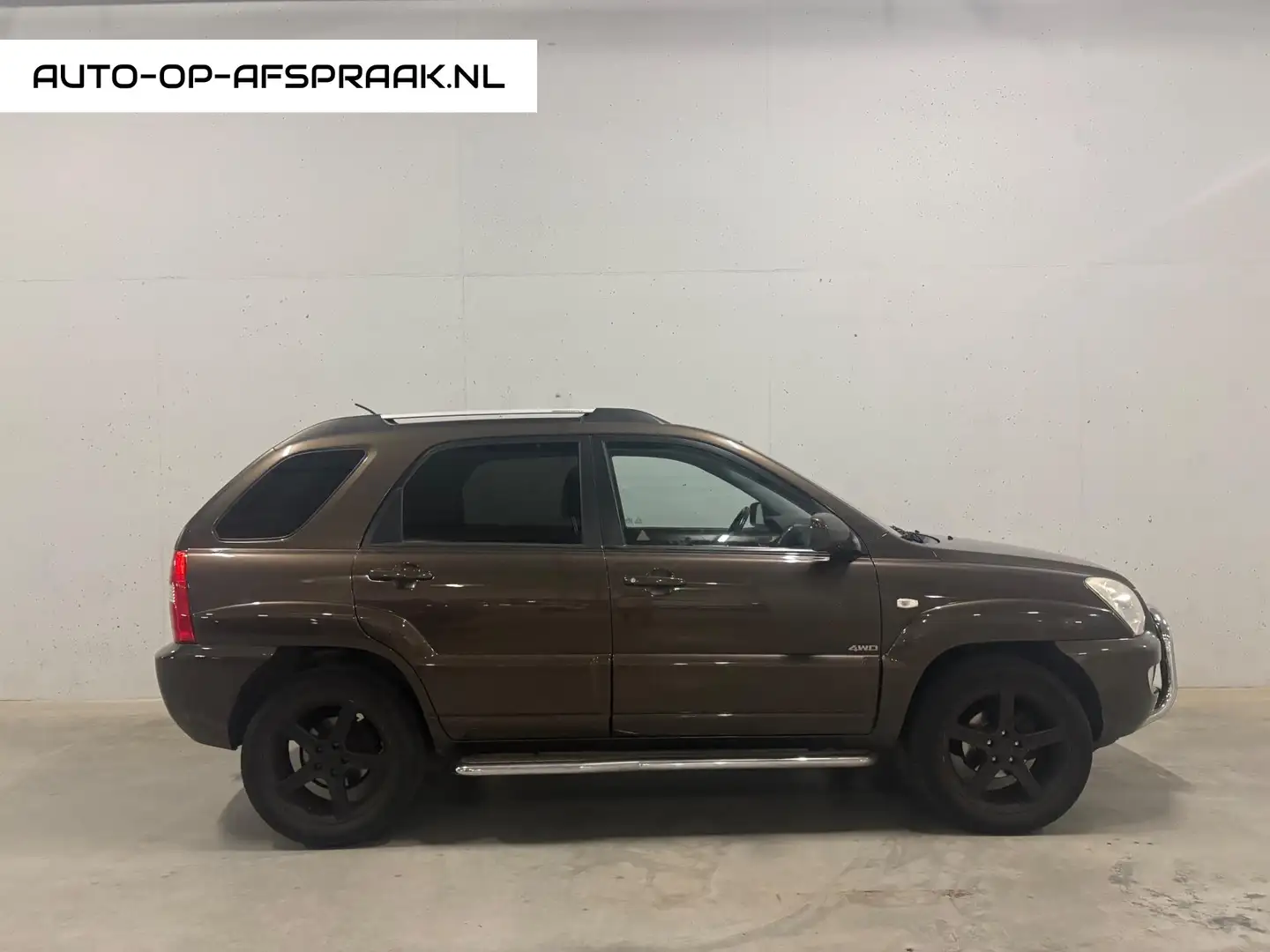 Kia Sportage 2.7 V6 X-pression 4x4 Leer Automaat Bruin - 1