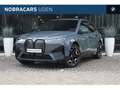 BMW iX xDrive50 High Executive / Sportpakket / Trekhaak / Grijs - thumbnail 1