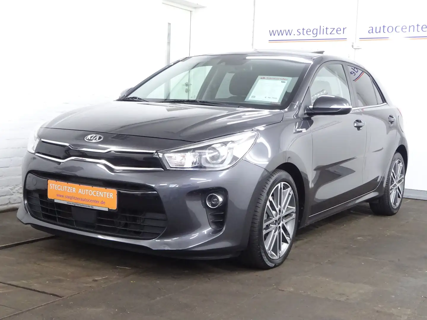 Kia Rio 1.0 TGDI Platinum Edition DCT Navi/Kamera/PDC/SD Grau - 1