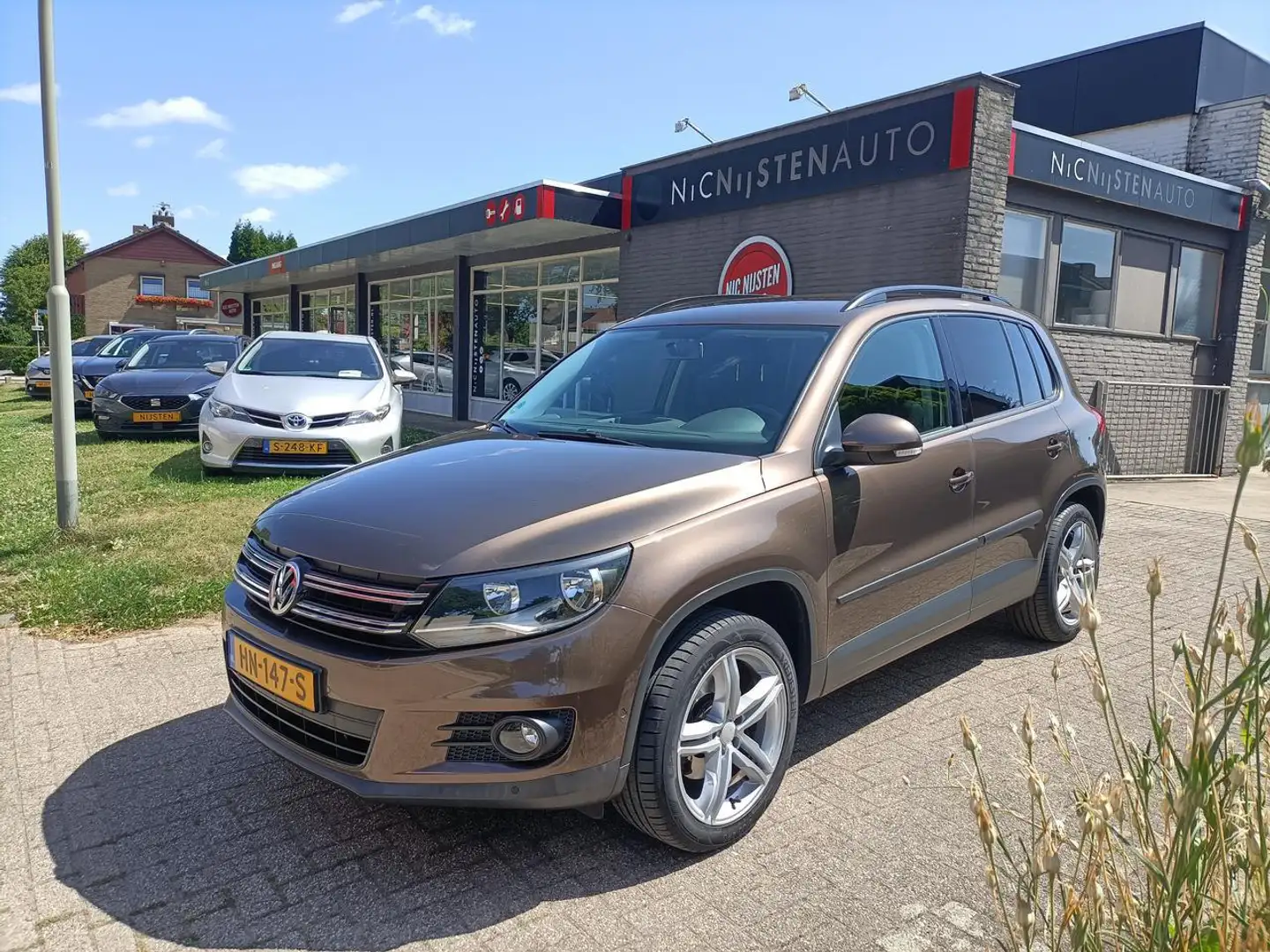 Volkswagen Tiguan 1.4 TSi, Trekhaak, Clima, Parkeerass. Bruin - 1